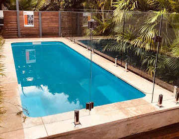 Frameless Glass pool fence around square pool