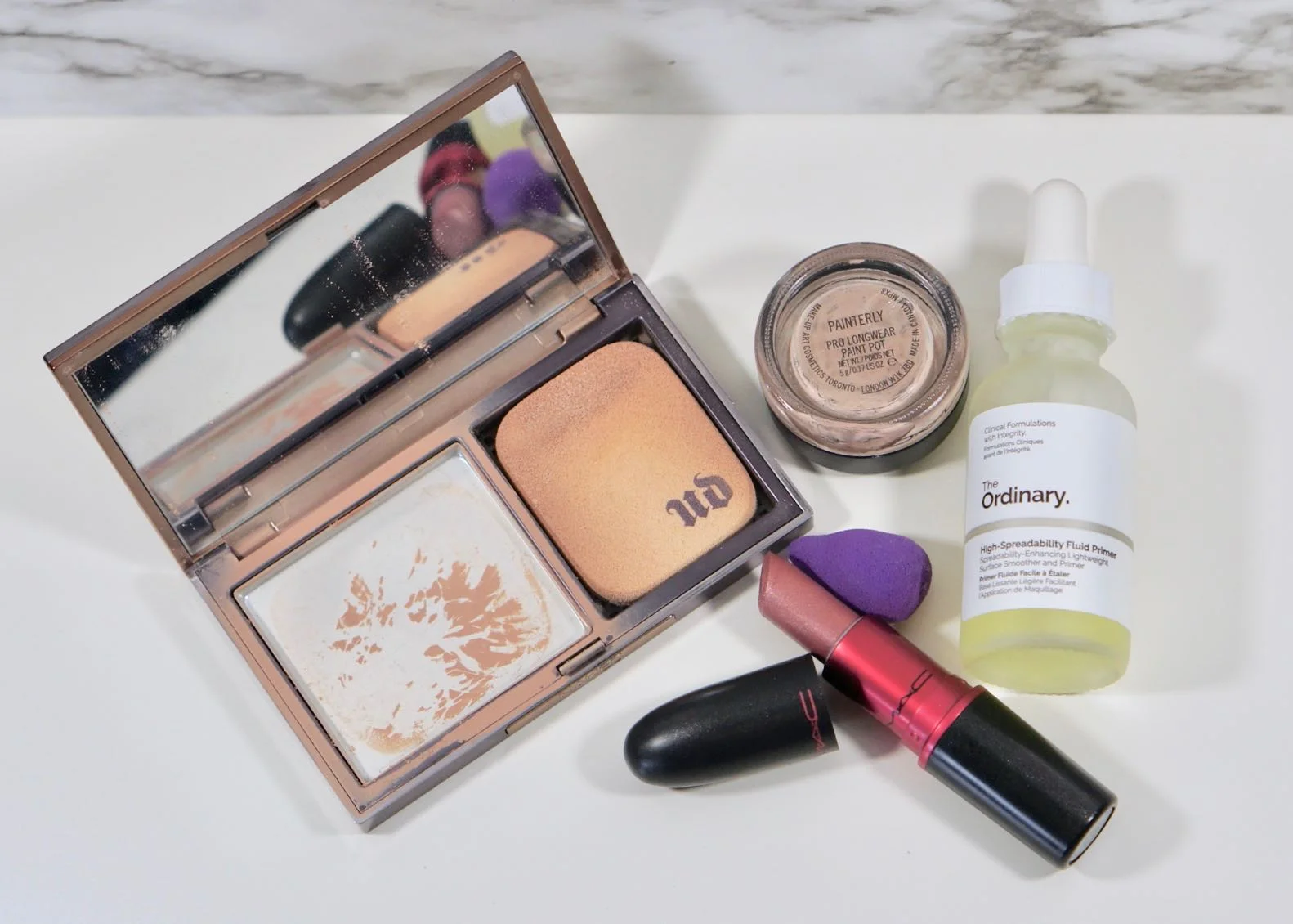A few makeup goodies, half used up half tosses.
