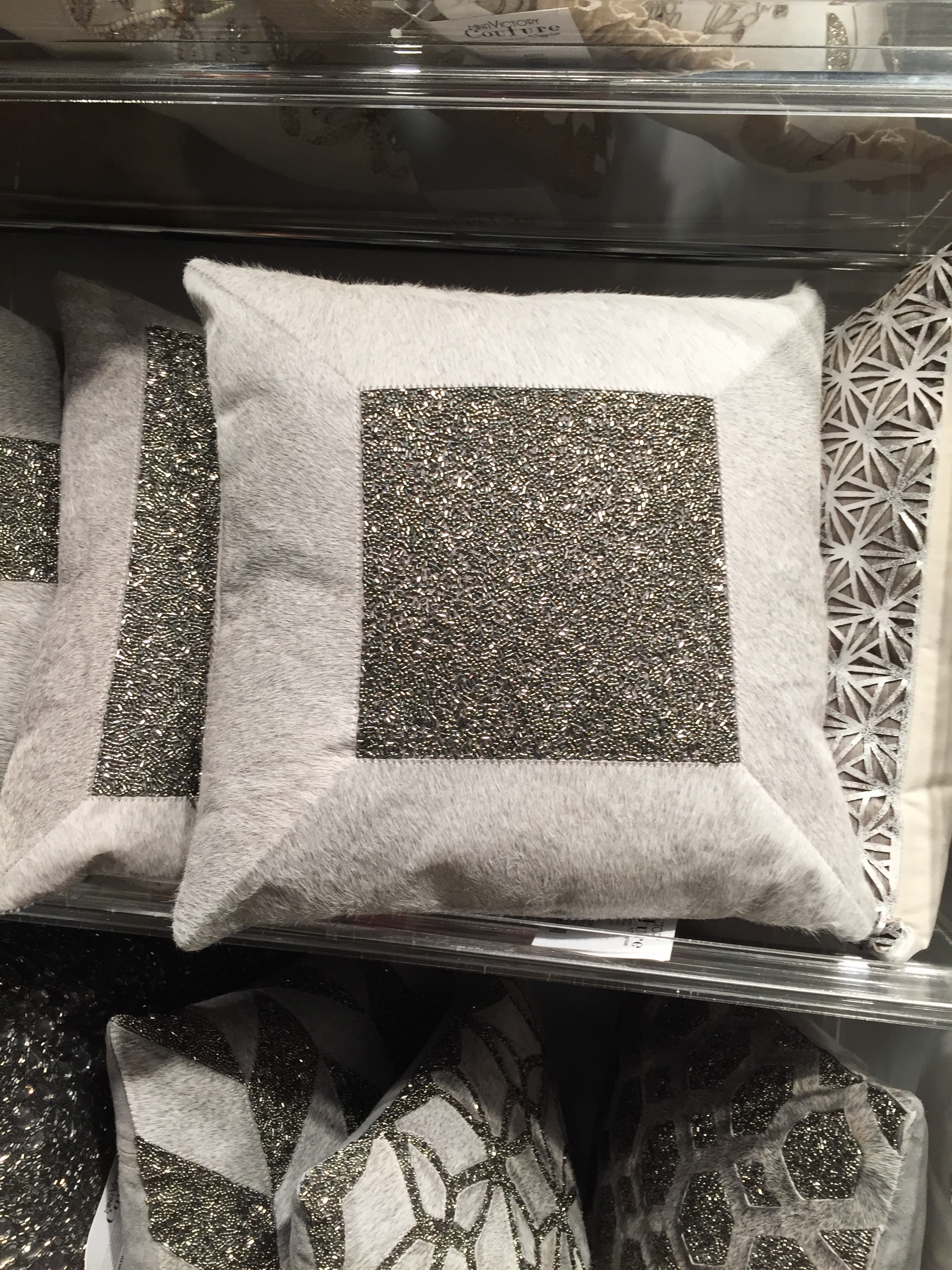 Hair on hide pillows with a little bling! 