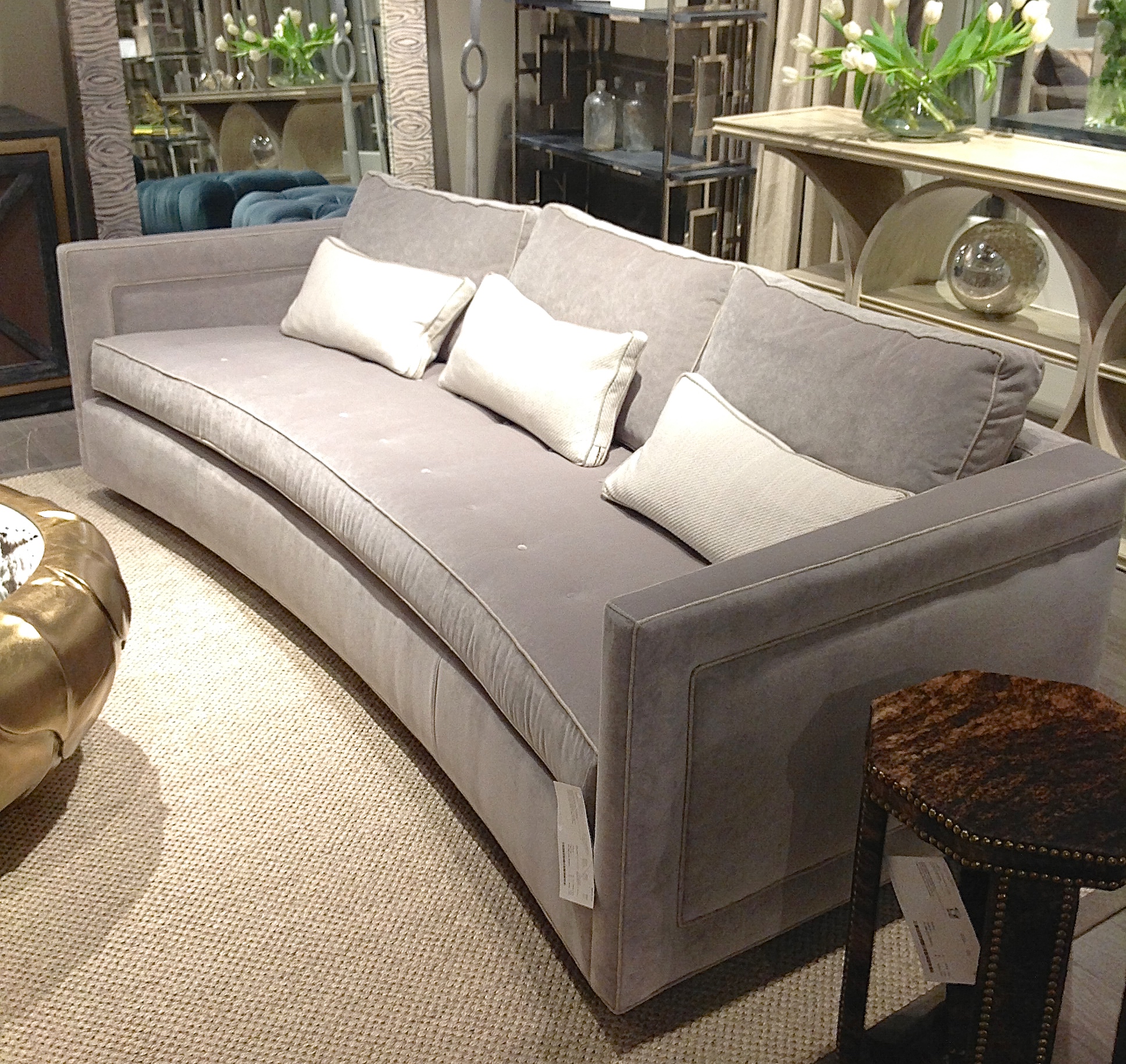 A beautiful, comfortable sofa with the perfect subtle curve on the front to add a little personality! Pick your fabric to make this sofa to your liking! 