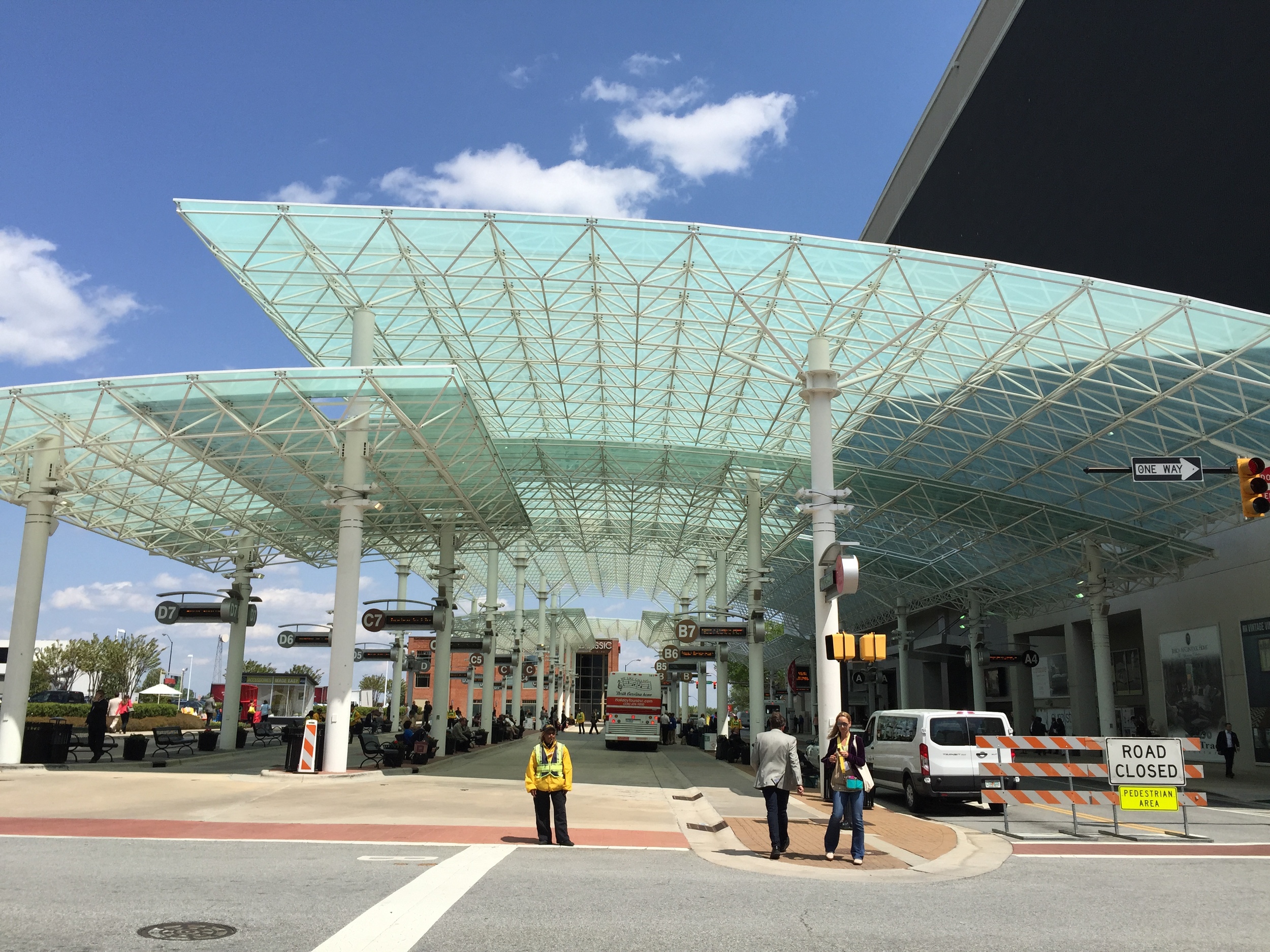 Admiring the ceiling design of the bus/cab terminal in front of the IHFC Building 