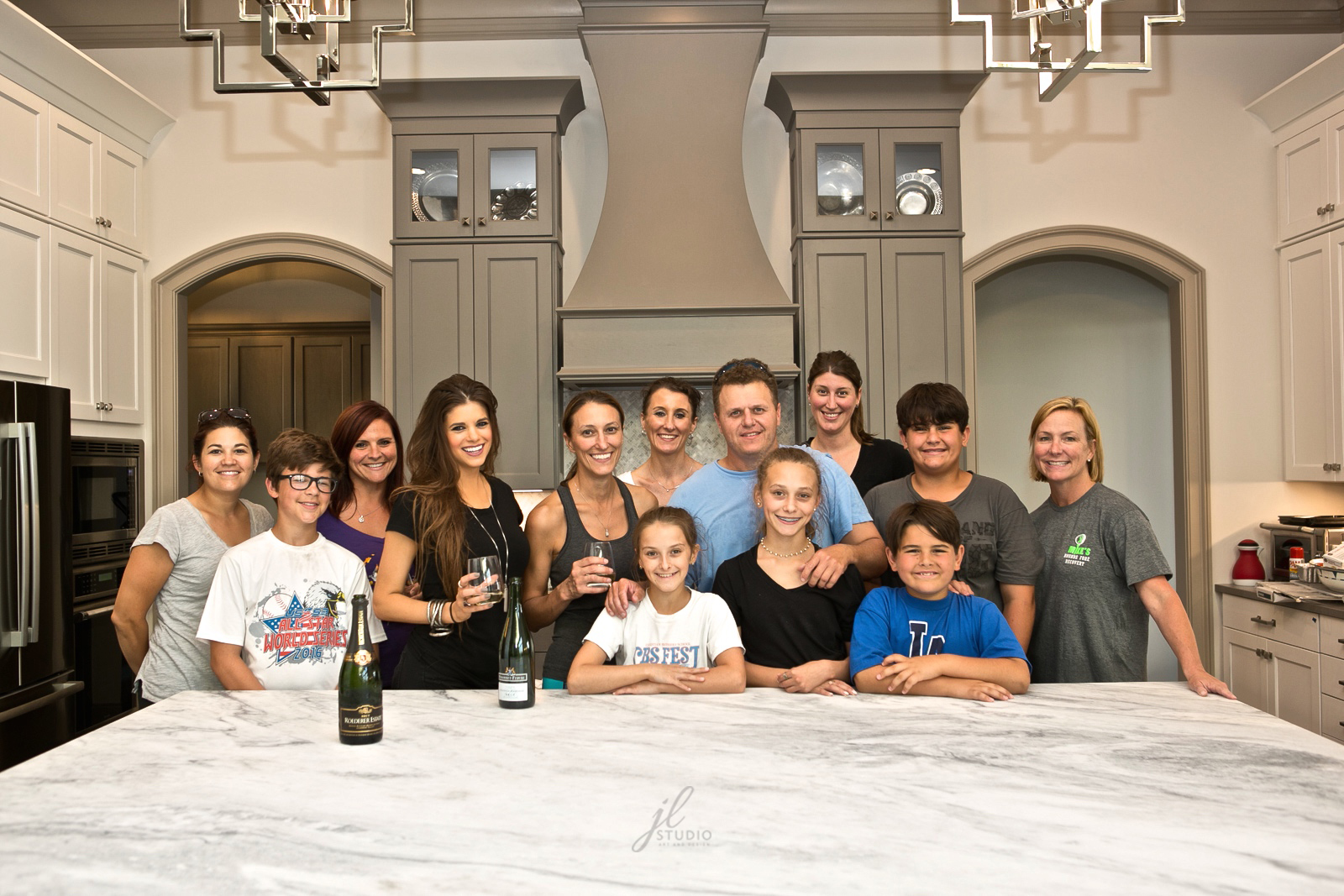 Friends and family toast to a successful move into their brand new home! 