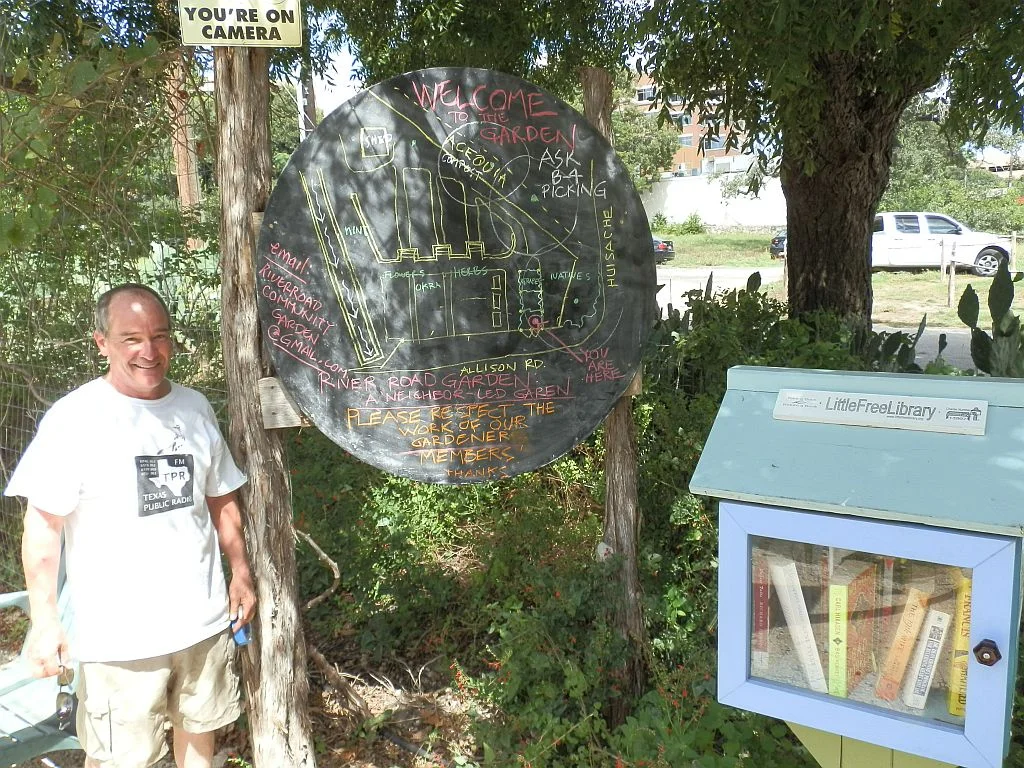 Larry Clark- Garden Steward and River Road Neighborhood resident. Little Free Library donated and built by local resident Ed. 
