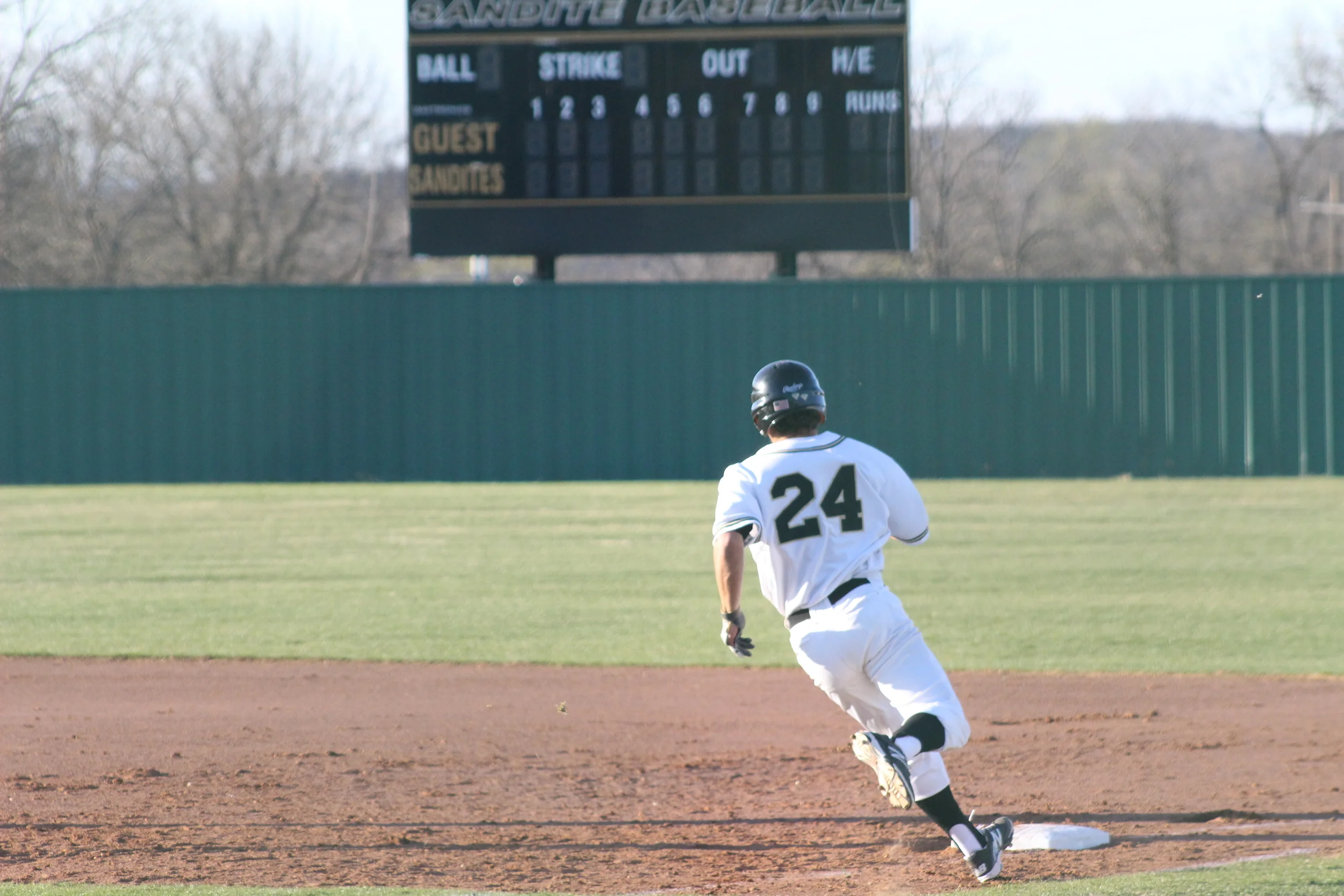 Rhett Rutledge rounds first base. 