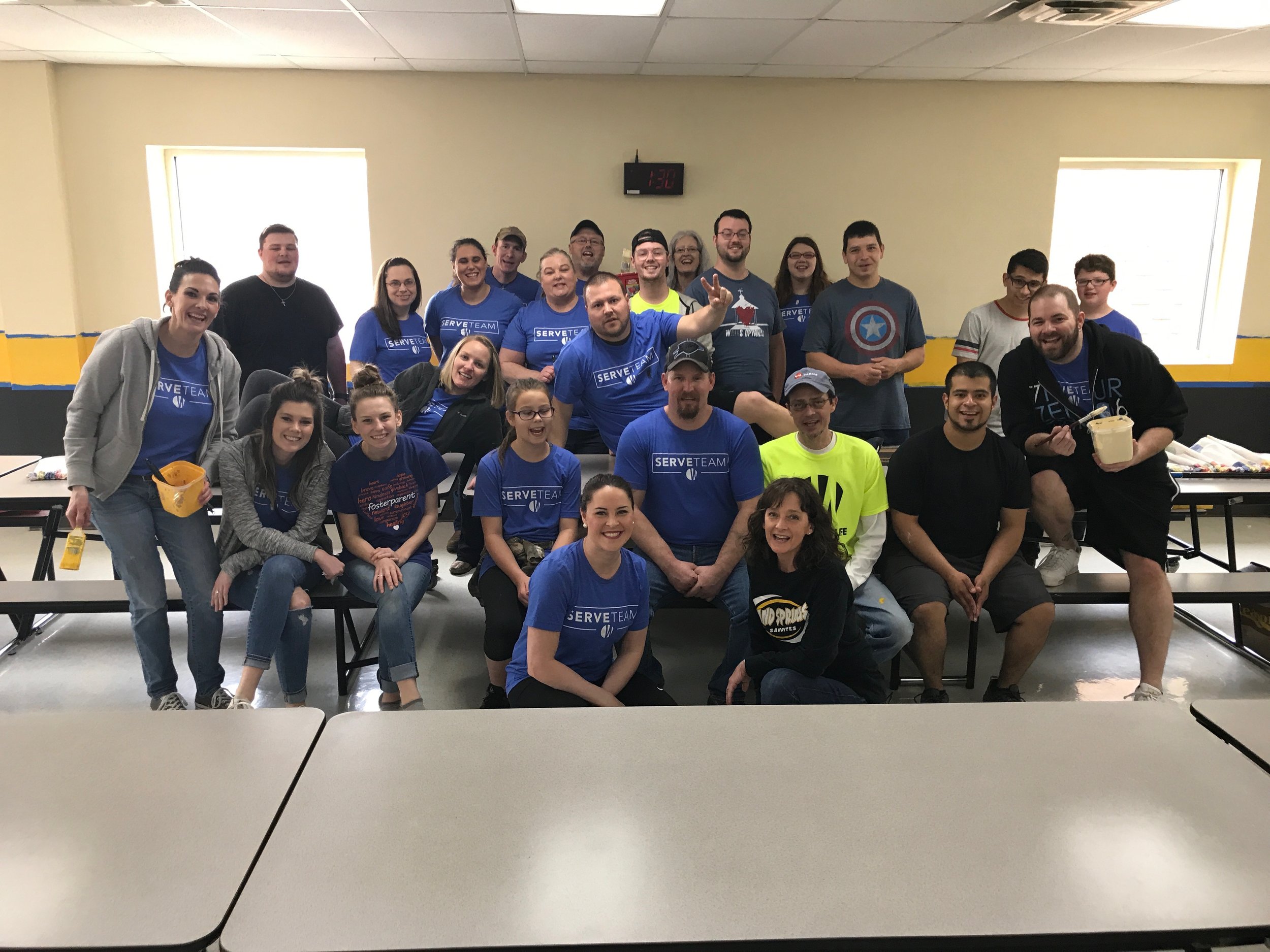  Forty Word of Life volunteers spent several hours painting the Limestone Technology Academy cafeteria Sunday after church. (Photo: Micah Felts). 