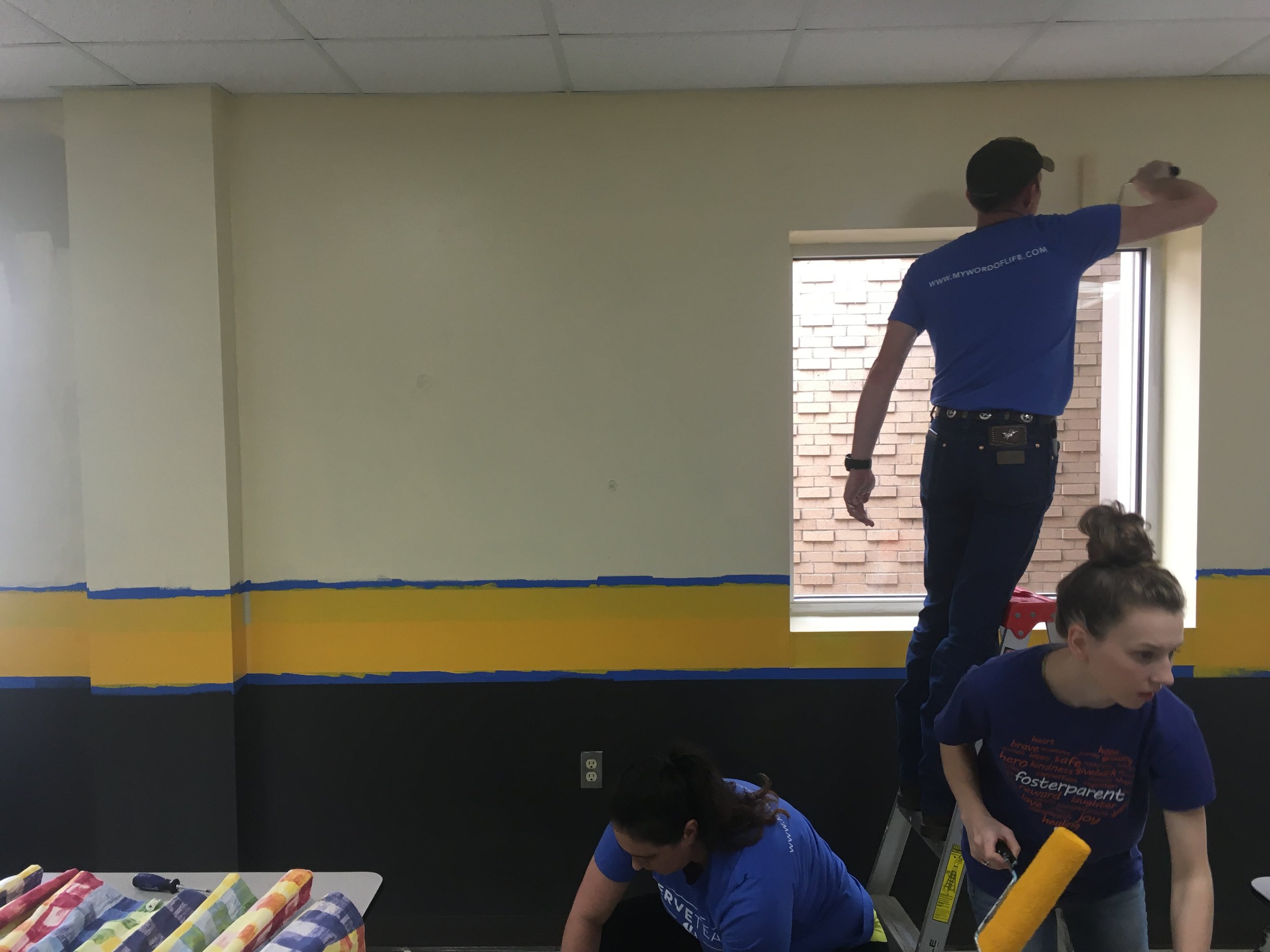  Forty Word of Life volunteers spent several hours painting the Limestone Technology Academy cafeteria Sunday after church. (Photo: Scott Emigh). 