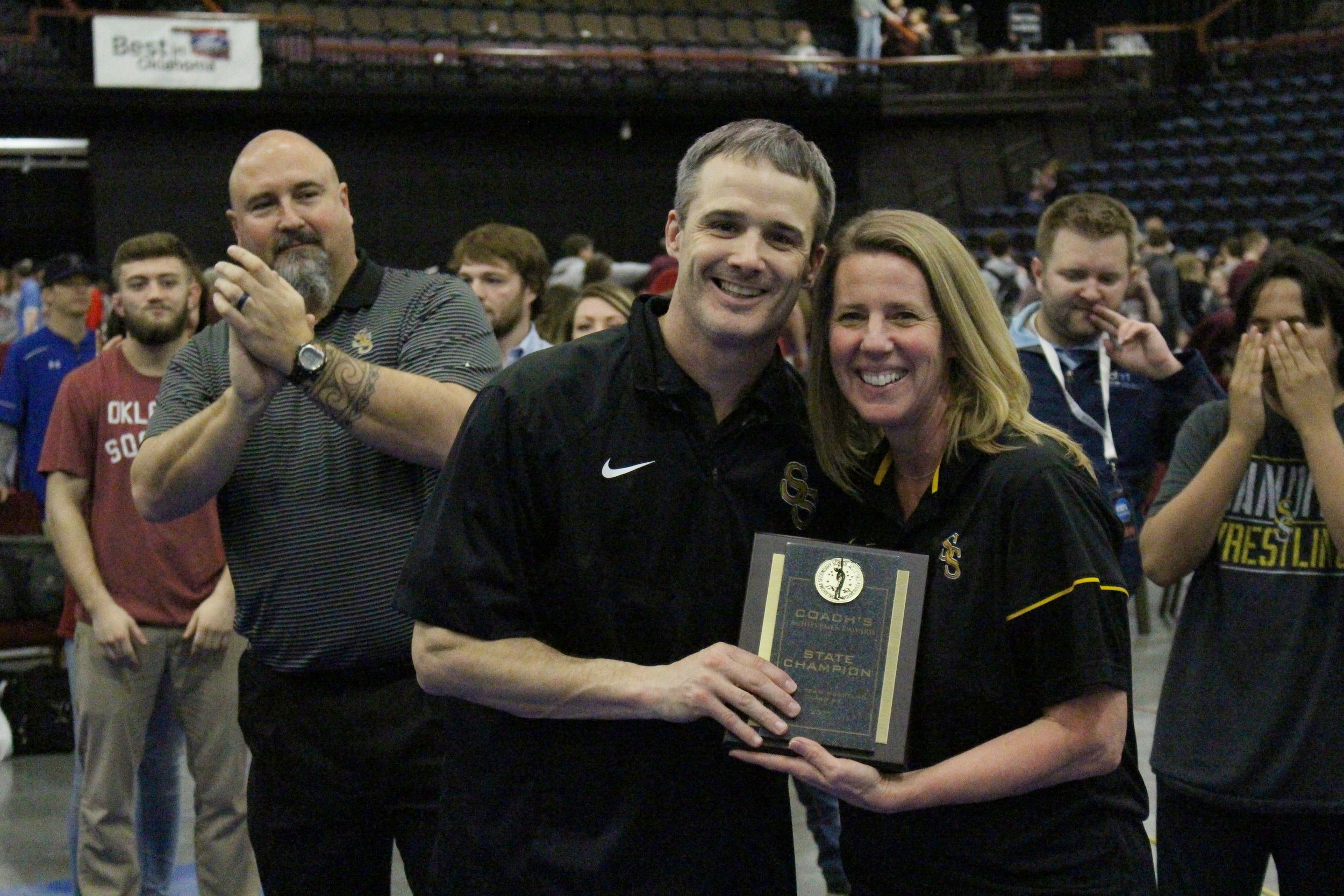  SSPS Superintendent Sherry Durkee presents CPHS Head Wrestling Coach Kelly Smith with the coach's plaque after winning the 2017 Dual State Championship. (Photo: Scott Emigh). 