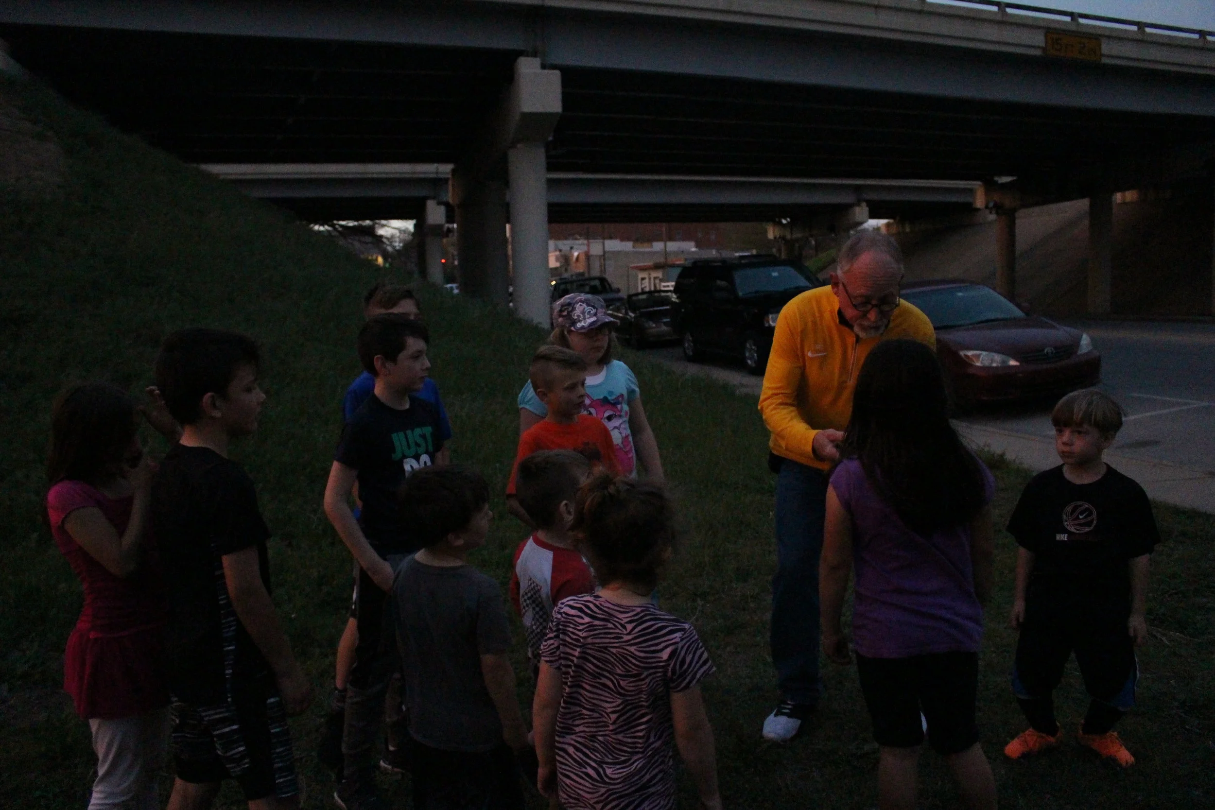  Sand Springs Mayor Mike Burdge leads kids in a countdown to the unveiling of the Main Street LED Light project.&nbsp; 