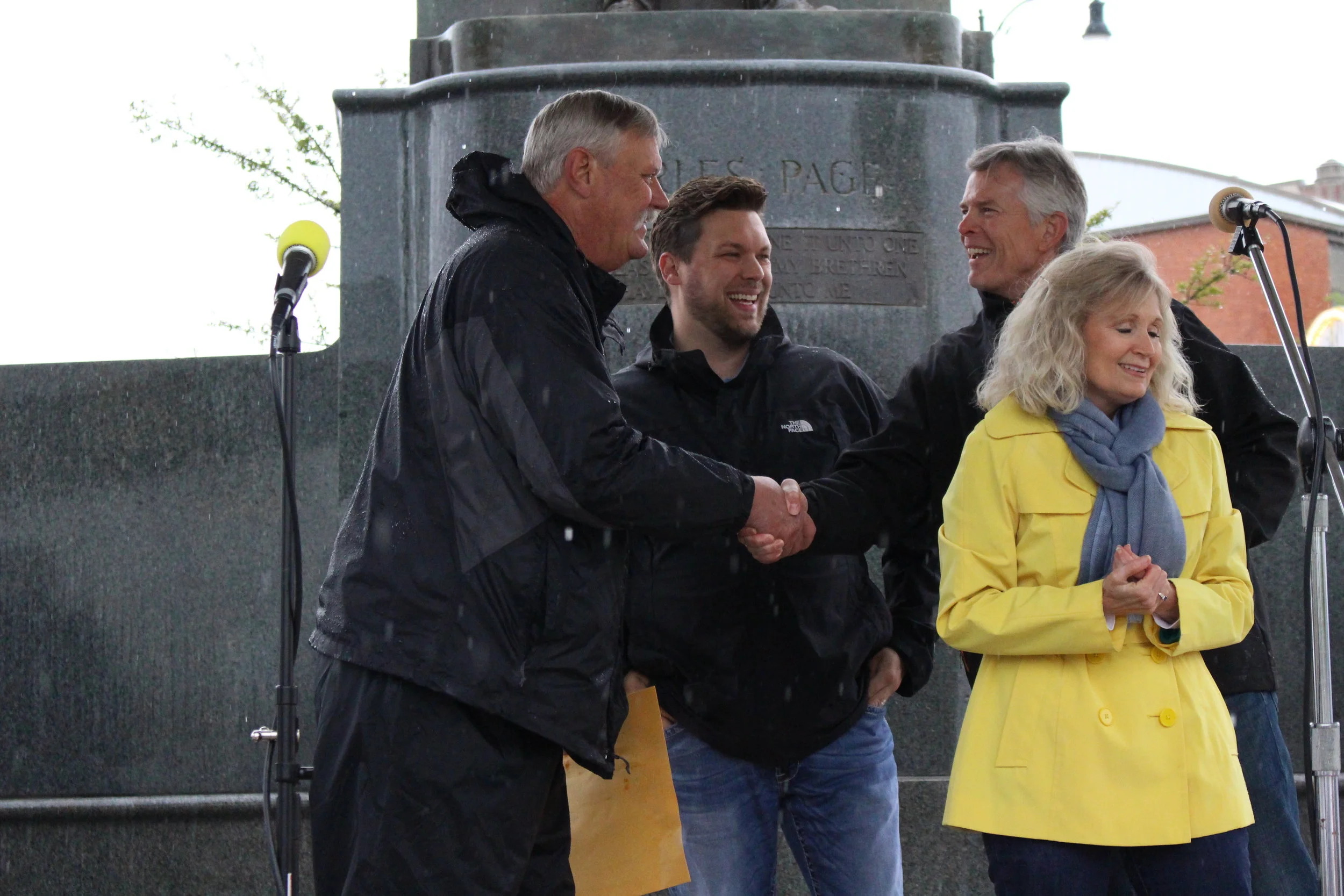  City Councilman Phil Nollan congratulates Jack Younger on receiving the Hometown Hero Award. 