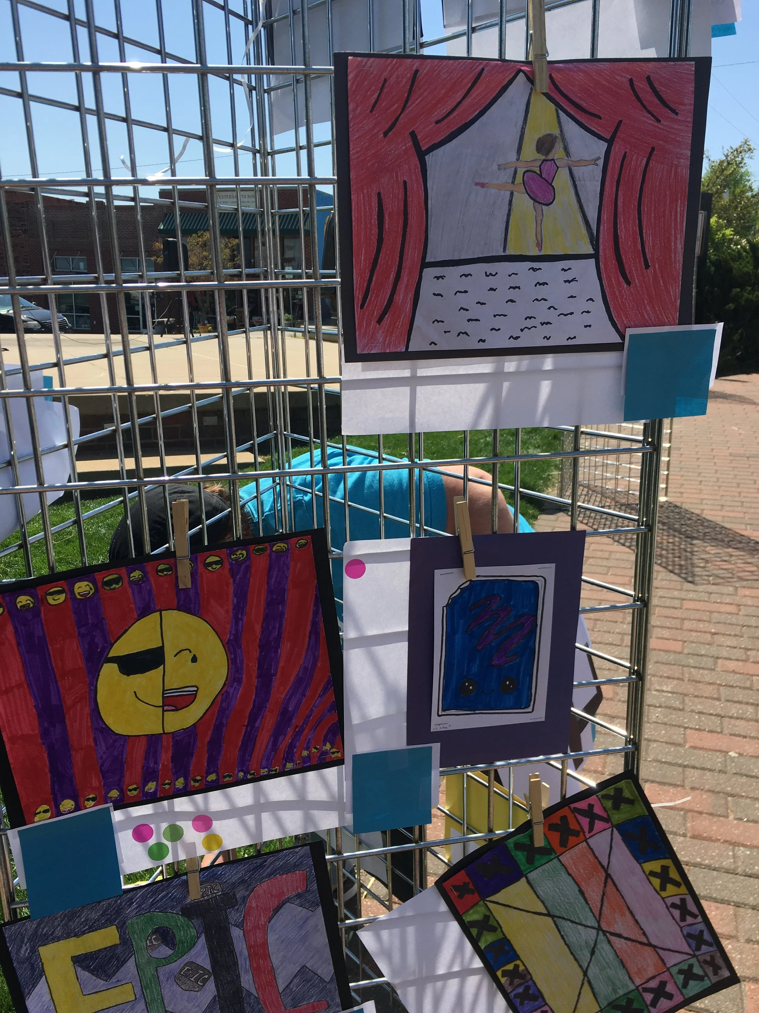  Art by students at Northwoods Fine Arts Academy is on display at the downtown Triangle Park. 