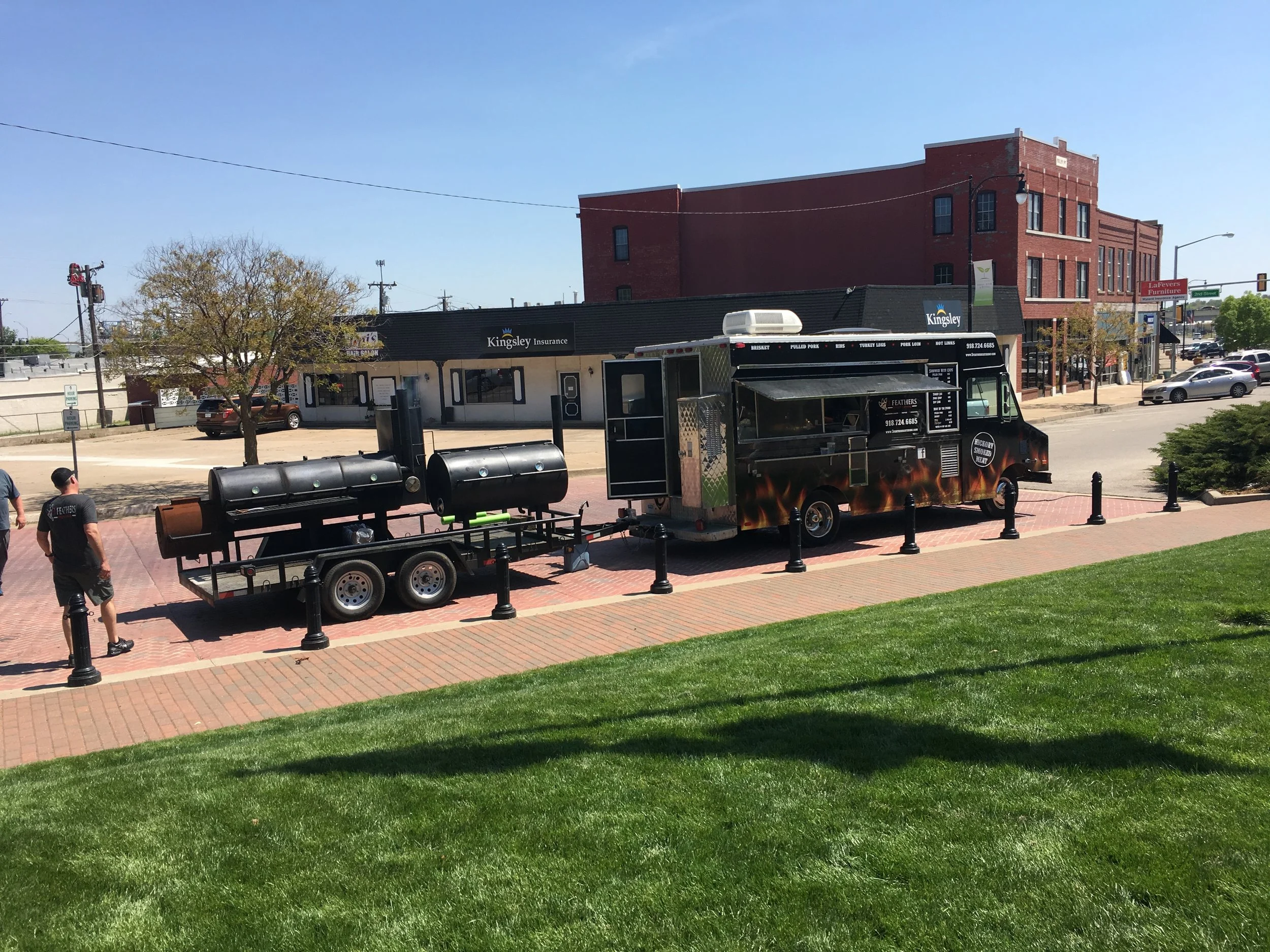  3 Feathers BBQ serves up delicious meats at the Art in the Park fundraising event. 