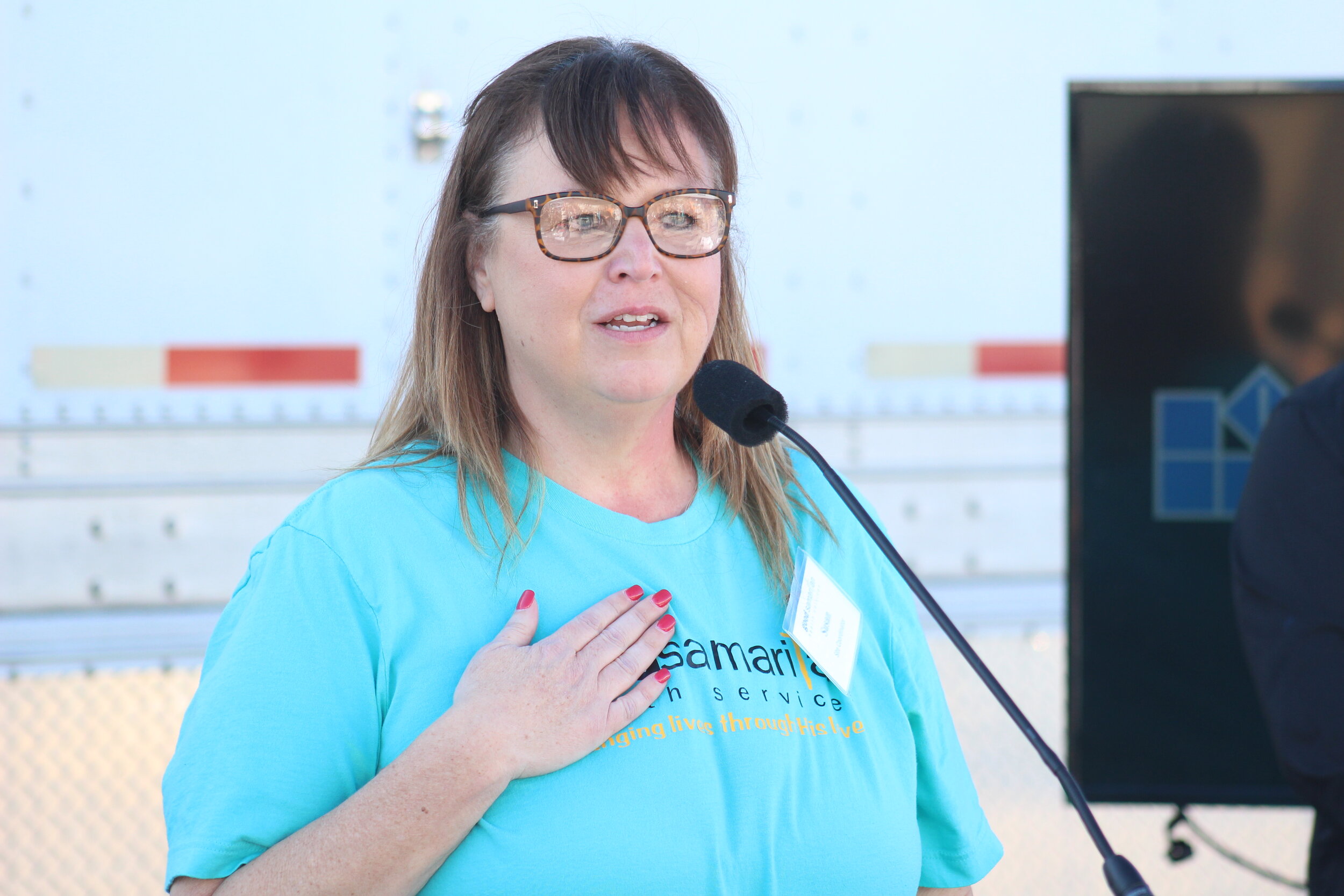  Site Coordinator Susan Hood speaks at the grand opening of the Sand Springs Good Samaritan Health Clinic. 