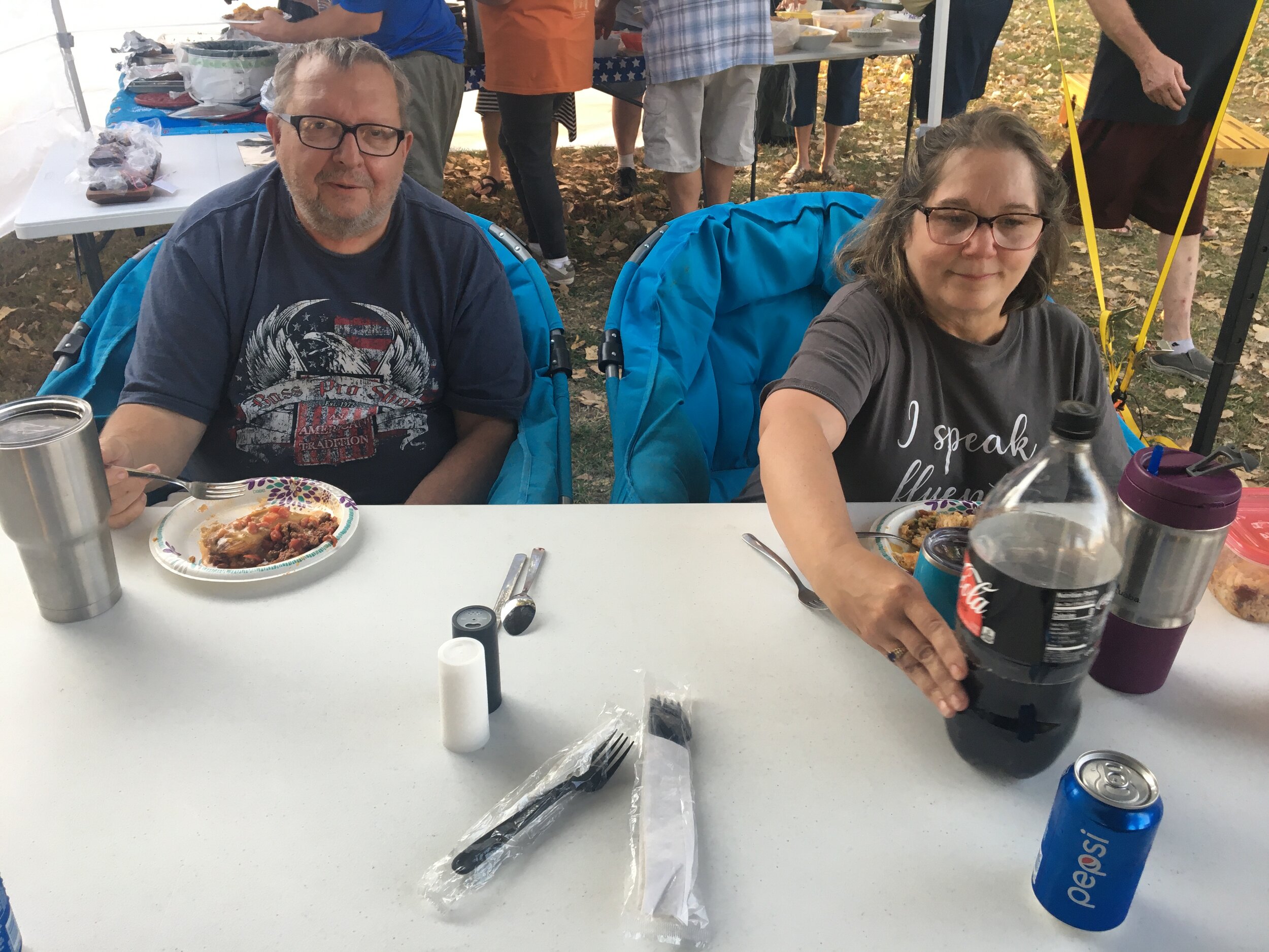  Sand Springs residents Bill and Pam Doyle enjoy a pot luck dinner during the Wheeler Dealers Camping Club campout at El Dorado State Park in October. 