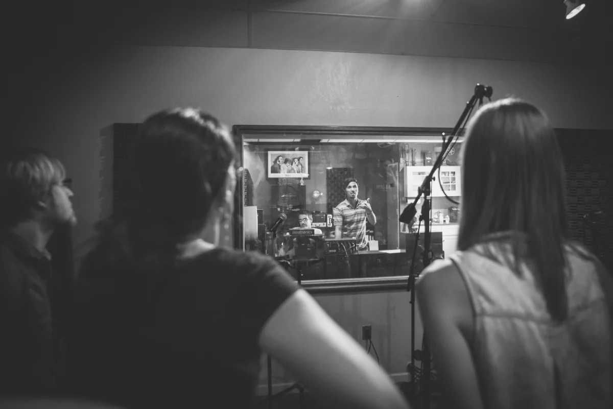 Gregg in the studio recording the soundtrack with the cast.