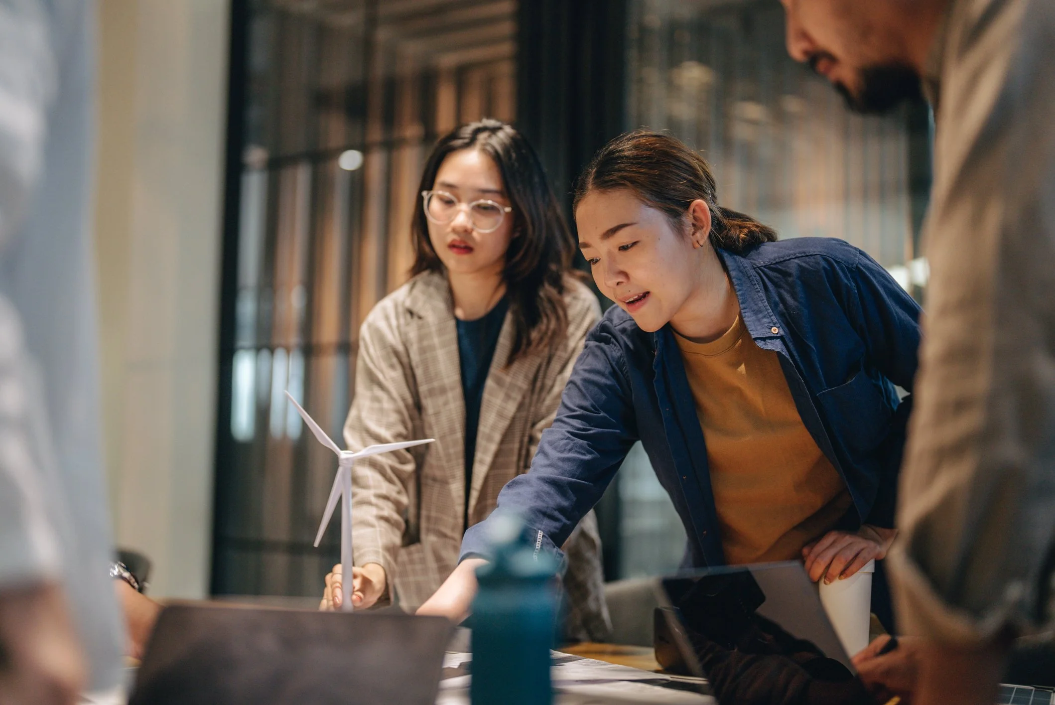 Employees were standing together for meeting.