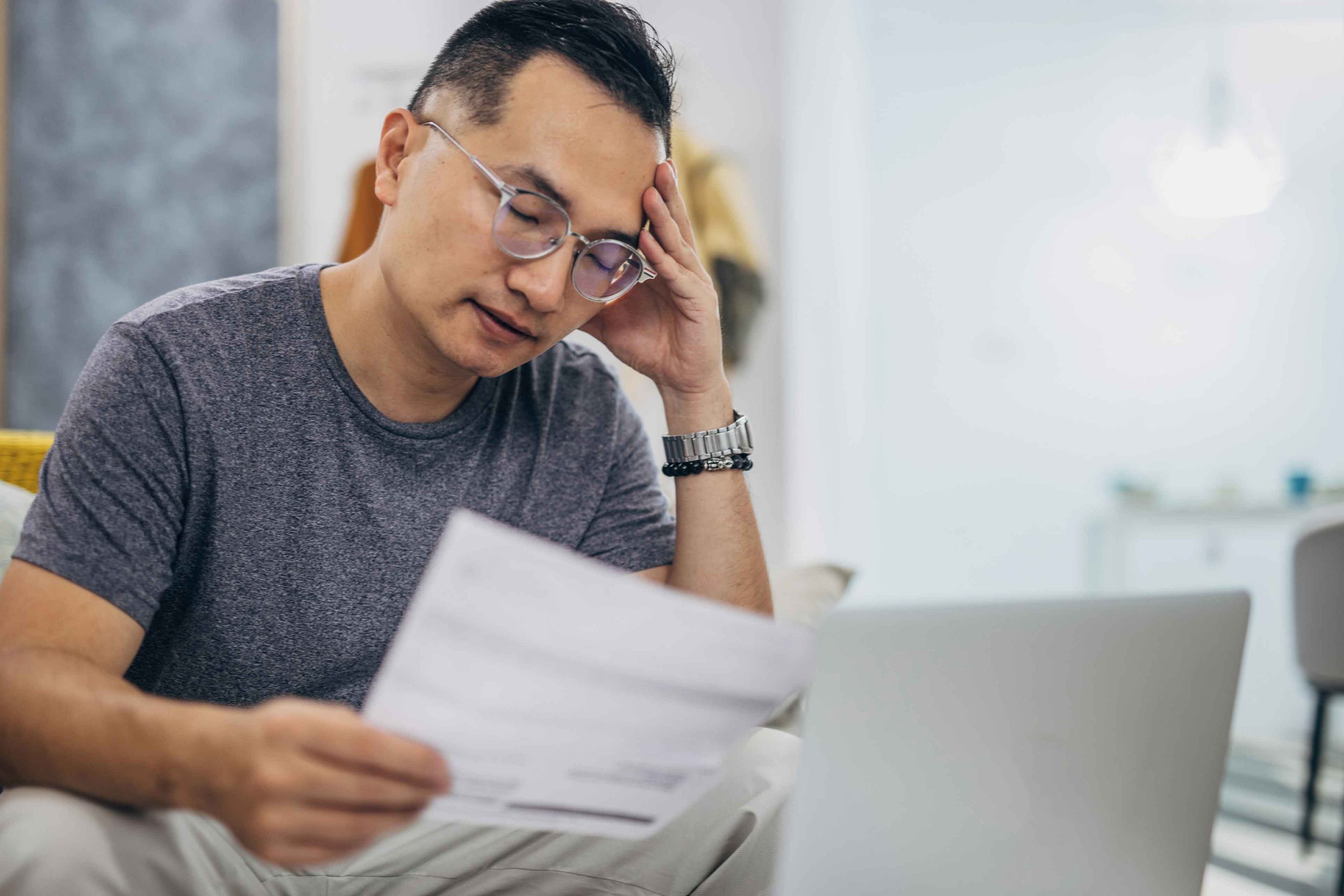 Homeowner is getting headache looking at bills.
