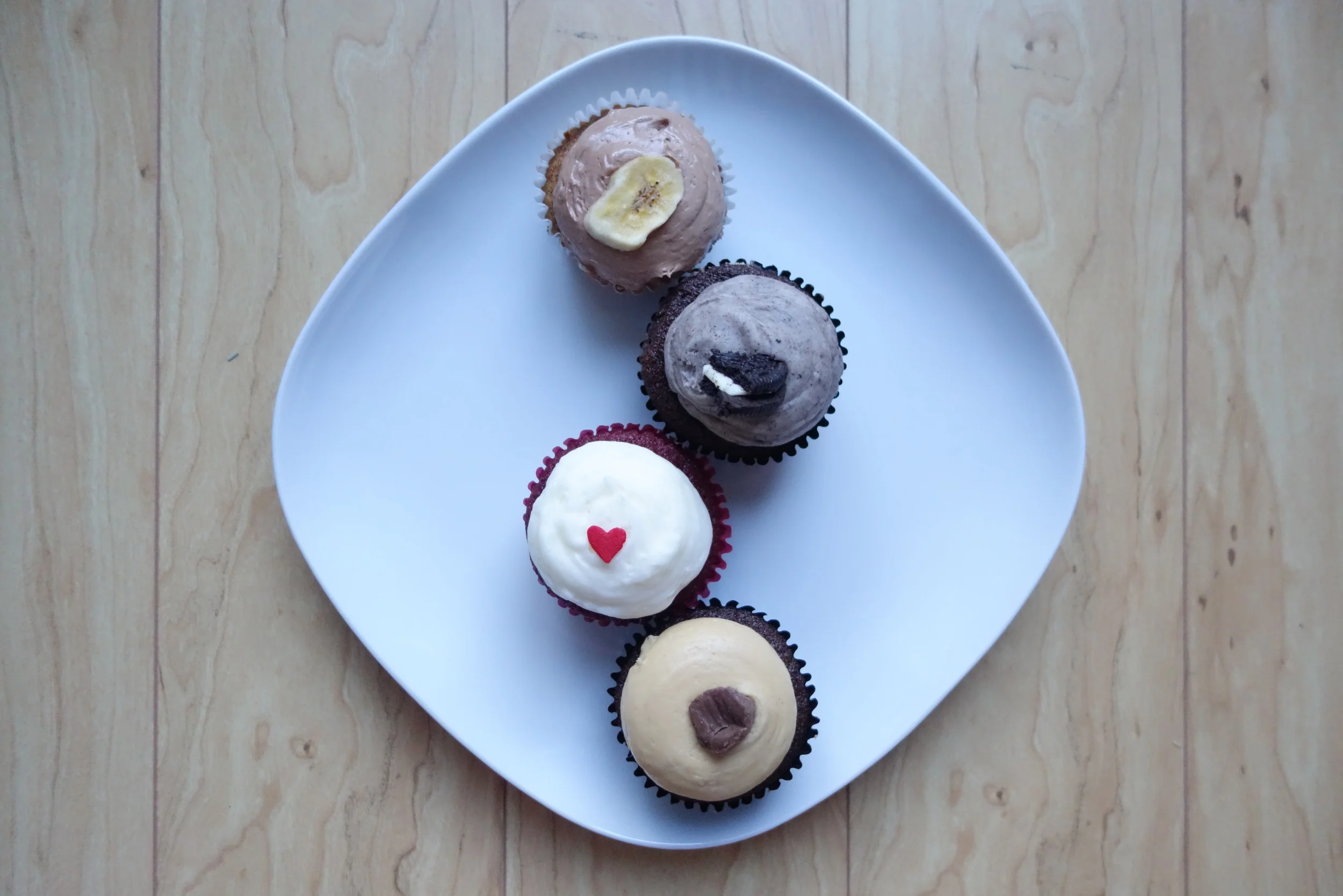 Cupcakes by We The Minis. From Top: Banana Nutella, Cookies n' Cream, Red Velvet & Peanut Butter Cup.