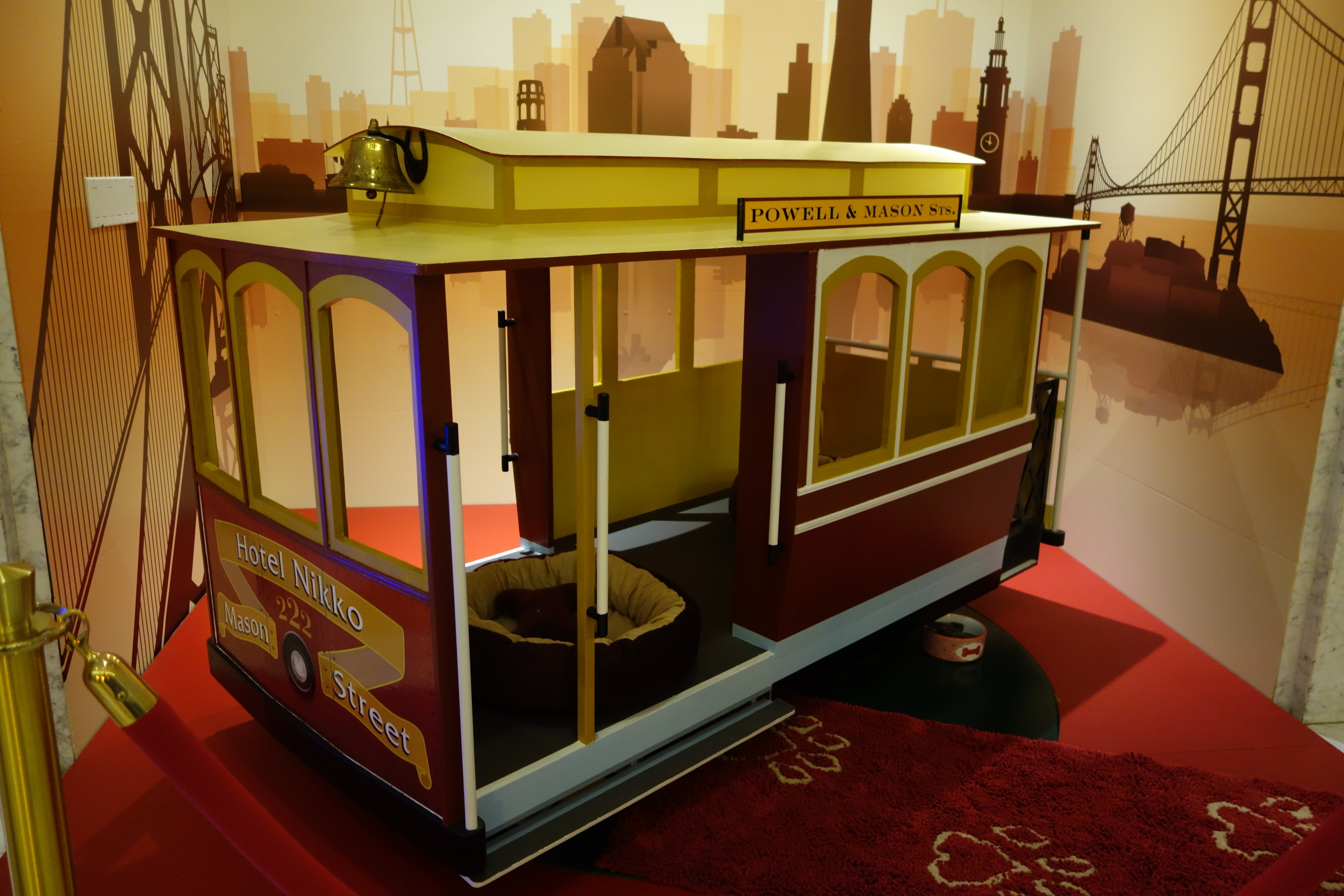 Miniature Cable Car Dog Bed in one of the lobbies of Hotel Nikko.