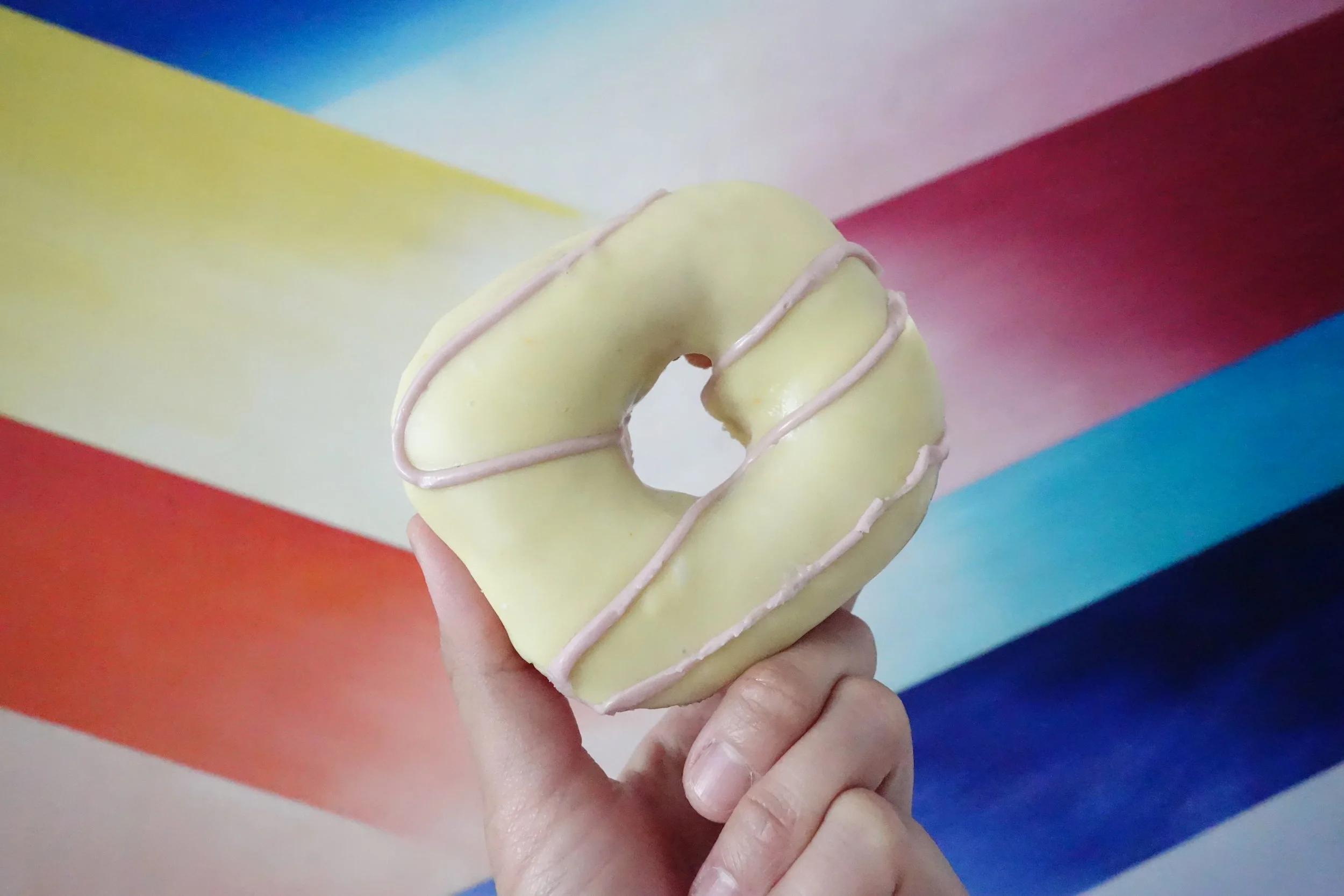 Glow-in-the-dark tri-color tangerine lime donut by Psycho Donuts.