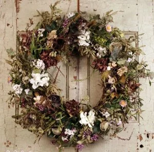 This shabby chic wreath has an antique yet festive feel 