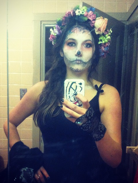 We created this hauntingly beautiful flower crown for a very special client's Calavera costume. We used roses, thistle, delphinium and ornithogalum to get the colors and texture she wanted to match her face paint. 