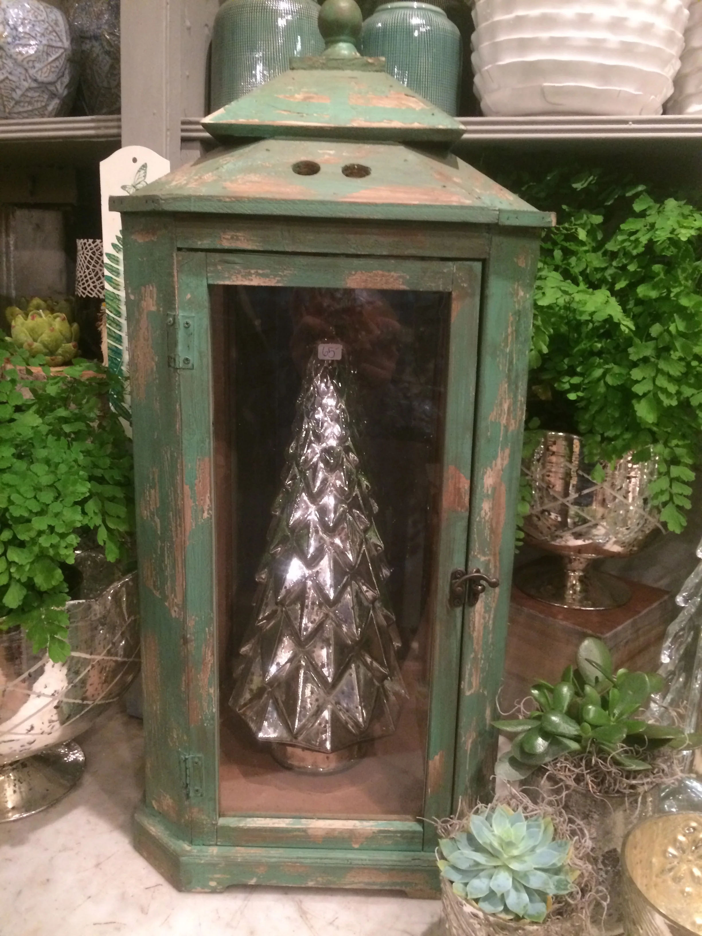 Our "Garden in Glass" lantern houses this special silver mercury tree. 