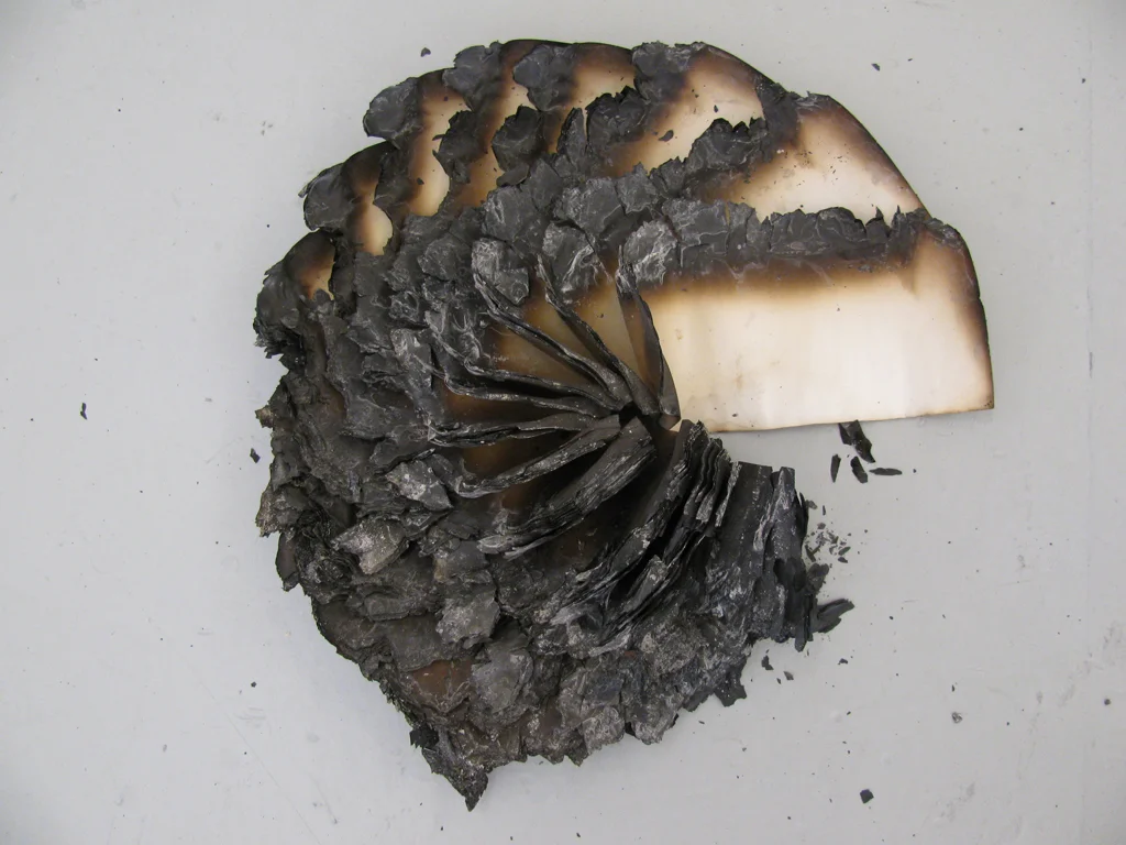 Tales of Former Objecthood, Tiny Relics 1, 2010, Paper, fire, 2x7x7 inches 