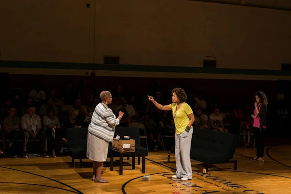 Michole Briana White, right, of Los Angeles, who plays a doctor who finds that a city’s water is contaminated, opposite Madelyn Porter of Detroit during “Public Enemy: Flint,” an adaptation of the Henrik Ibsen play “An Enemy of the People.” BRITTANY GREESON FOR THE NEW YORK TIMES