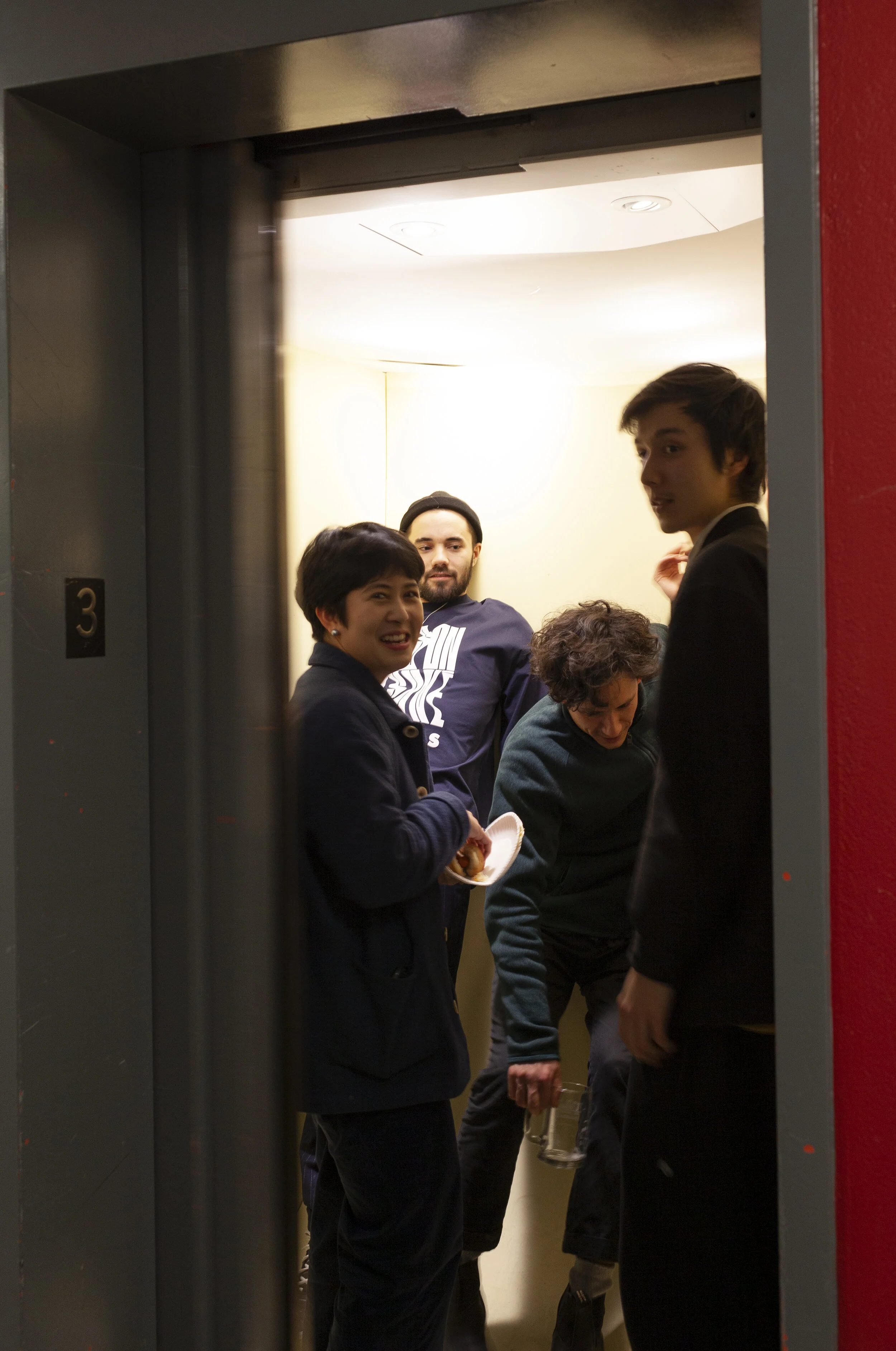 Colleagues experiencing the modified elevator.