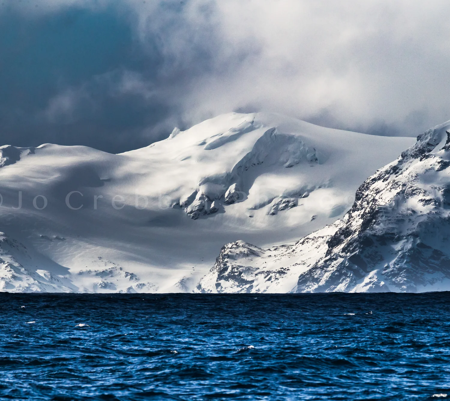 Dramatic snow scene of Elephant Islalnd near Antarctica penninsula.jpg