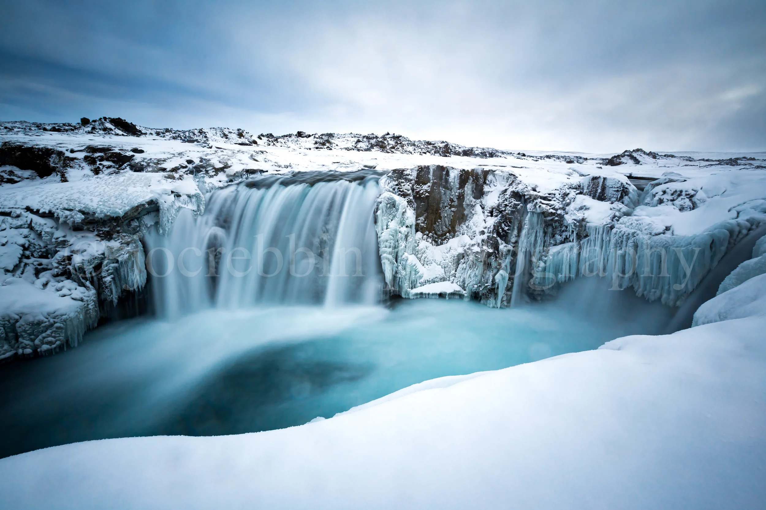 Frozen Hranabjargafoss waterfall during winter.jpg