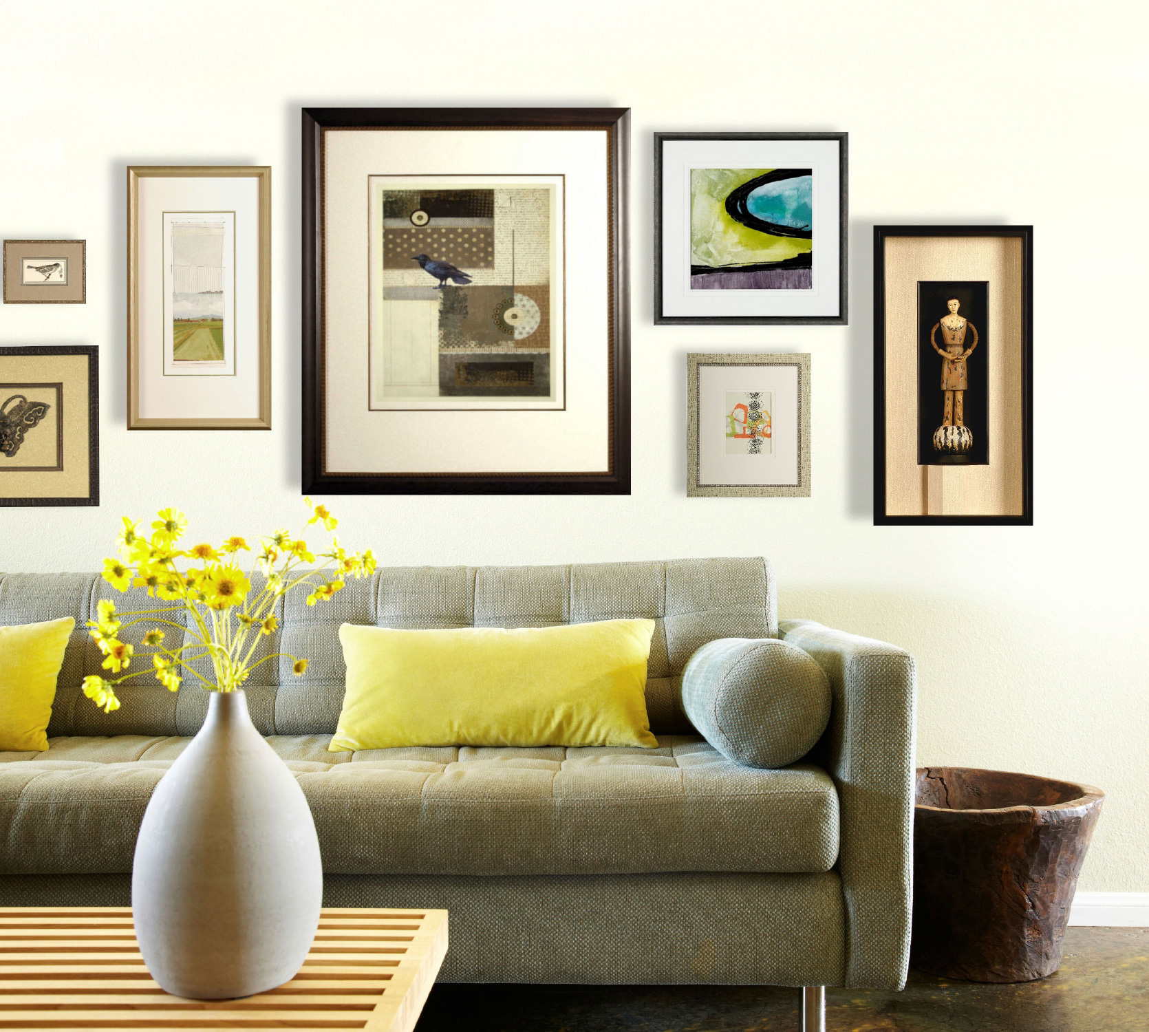 A variety of art hanging on living room wall