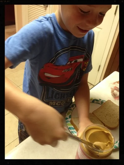 Helping mommy out, making his own sandwich. He was so proud. Such a good little helper! Got in a little fishing! :) Then, picked some dandelions and made a wish before blowing on the dandelions...... wishing to be back to running in the morning ;) 