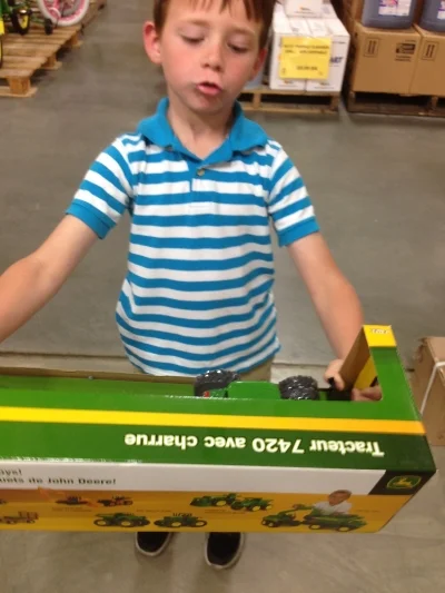We Went to the Agri Supply store to spend the money from the tooth fairy! Ben picked this tractor set. It was a bit more than the tooth fairy money, but for goodness sake, he lost 2 teeth in a week! I think that justifies this tractor set! 