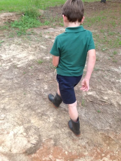 Farmer Ben heading to check out the Garden.... he takes gardening very serious! 