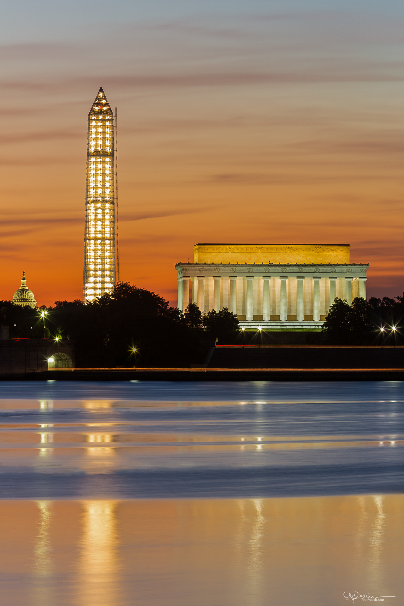  Three iconic DC landmarks at dawn, Lincoln Memorial, Washington Monument and Capitol Dome. Part of series showing Washington Monument while being repaired from earthquake damage. 