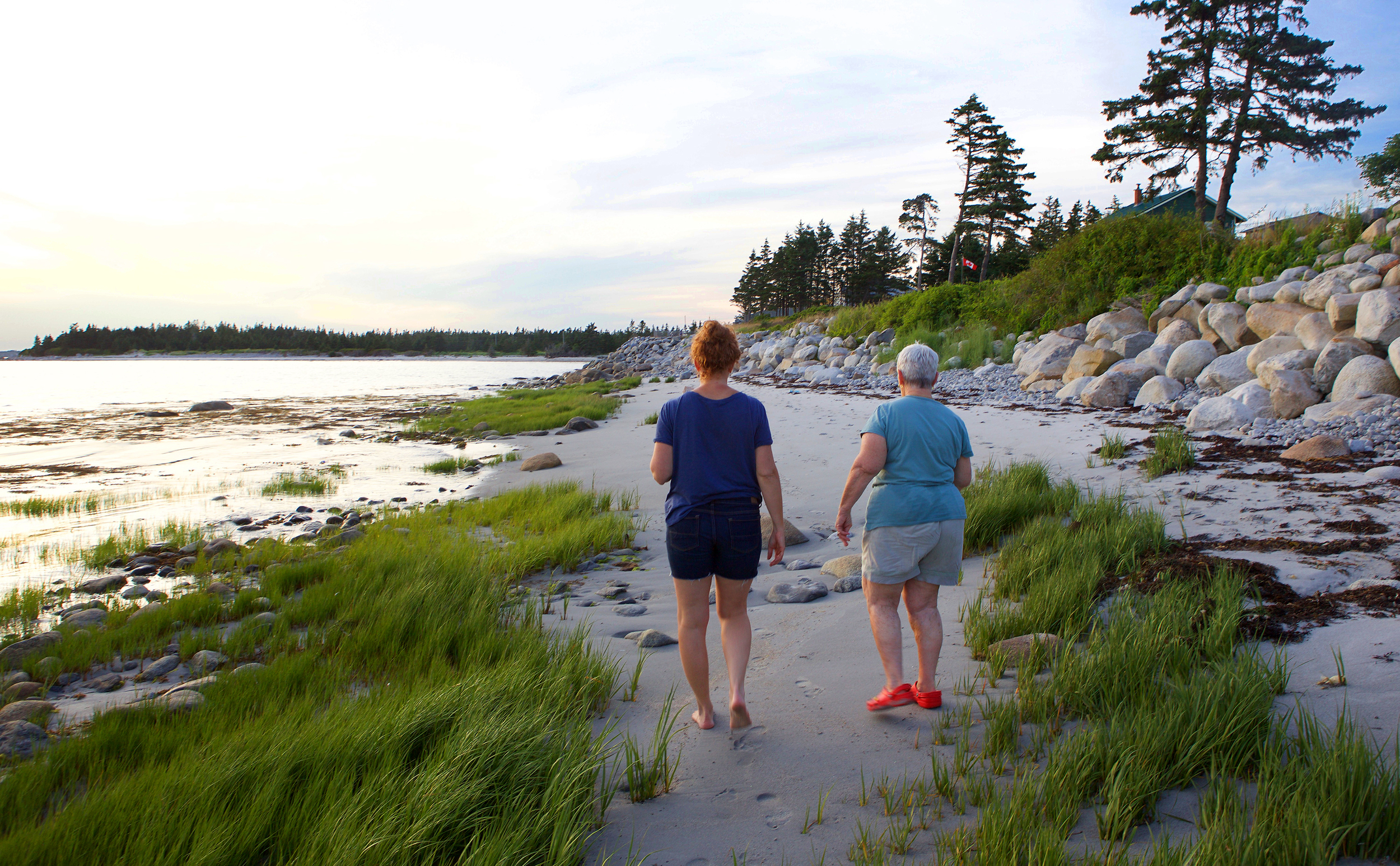  When the tide is in, walks are confined to the strip of sand and rocks between the water and the cottages. 