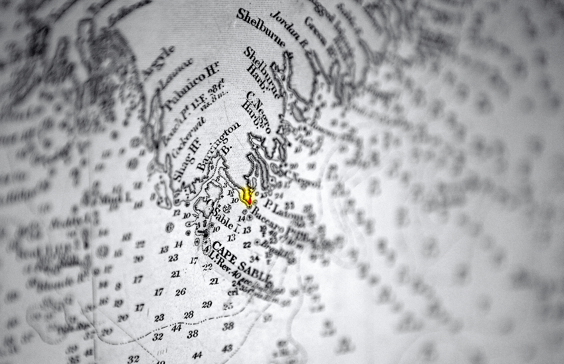  An old nautical chart of the area, pinned up on the wall of the cottage, highlights Sebim and adjacent Sandhills Provincial Park. 