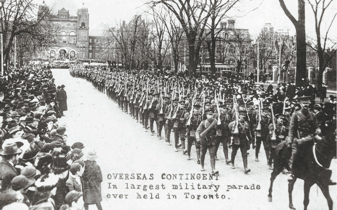 In November 1915, Lionel’s unit leads a procession through the streets of Toronto. (Toronto Public Library) 