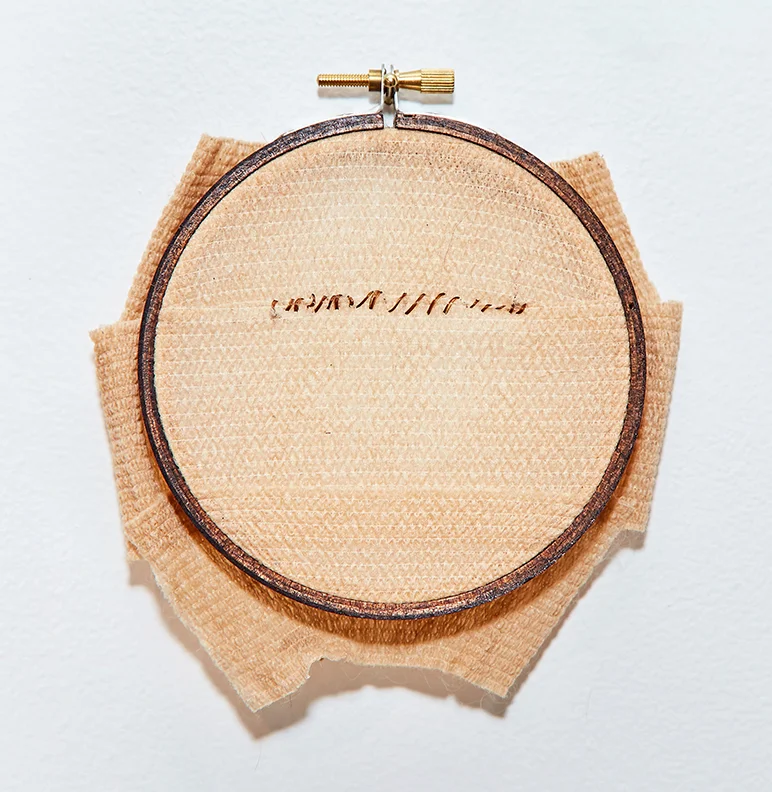 Incision , 2016 | Human hair, bandages in wooden embroidery hoop