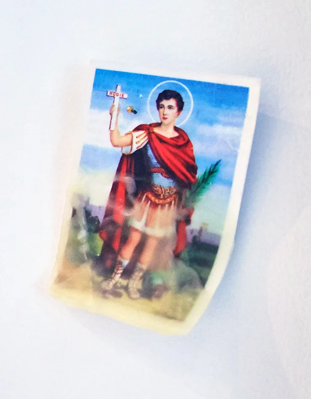 Santo Expedito , 2016 | Prayer card, beeswax, brass nail | 4" x 2.75"