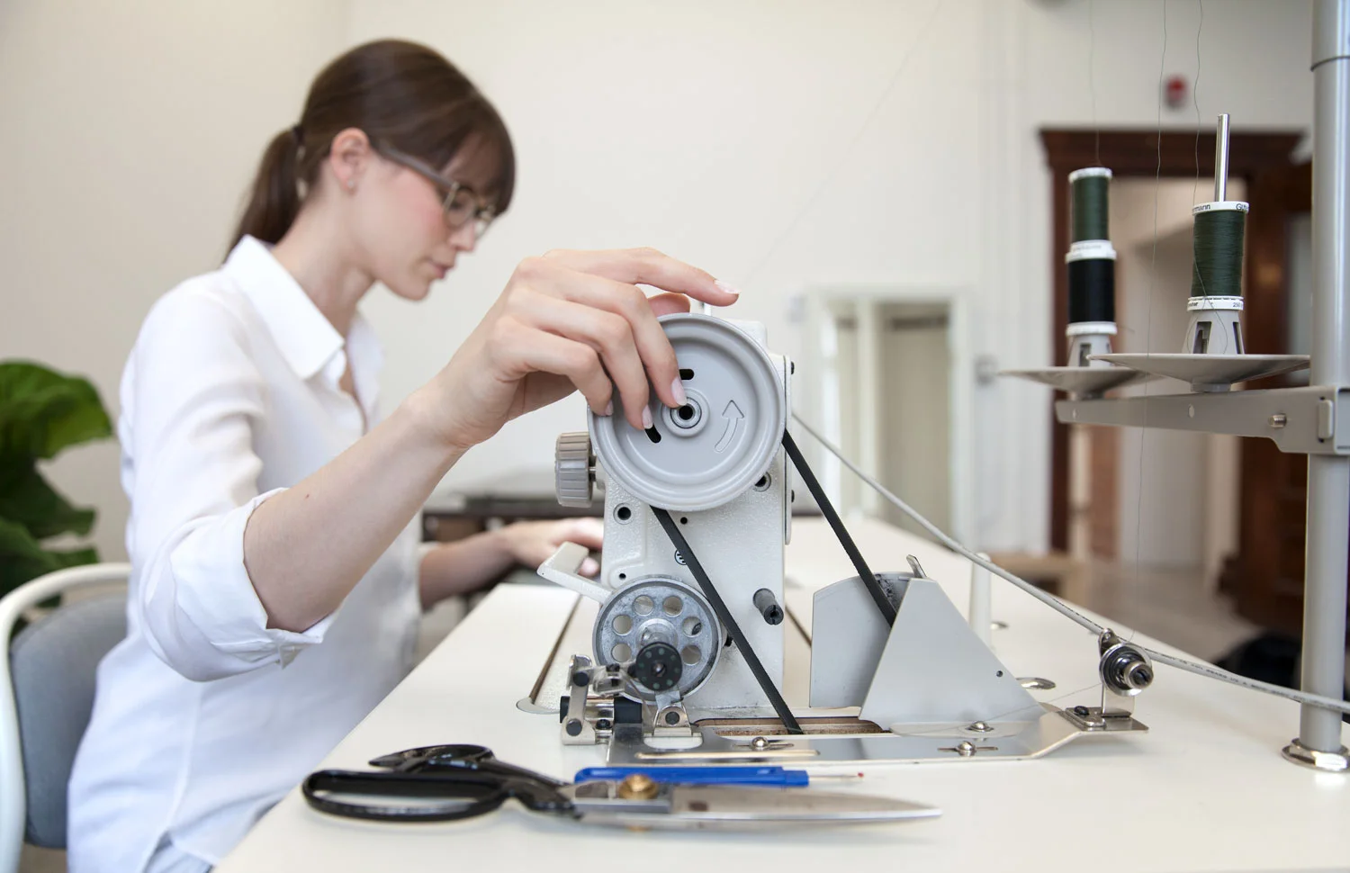 In my happy place on one of three Juki sewing machines in my studio