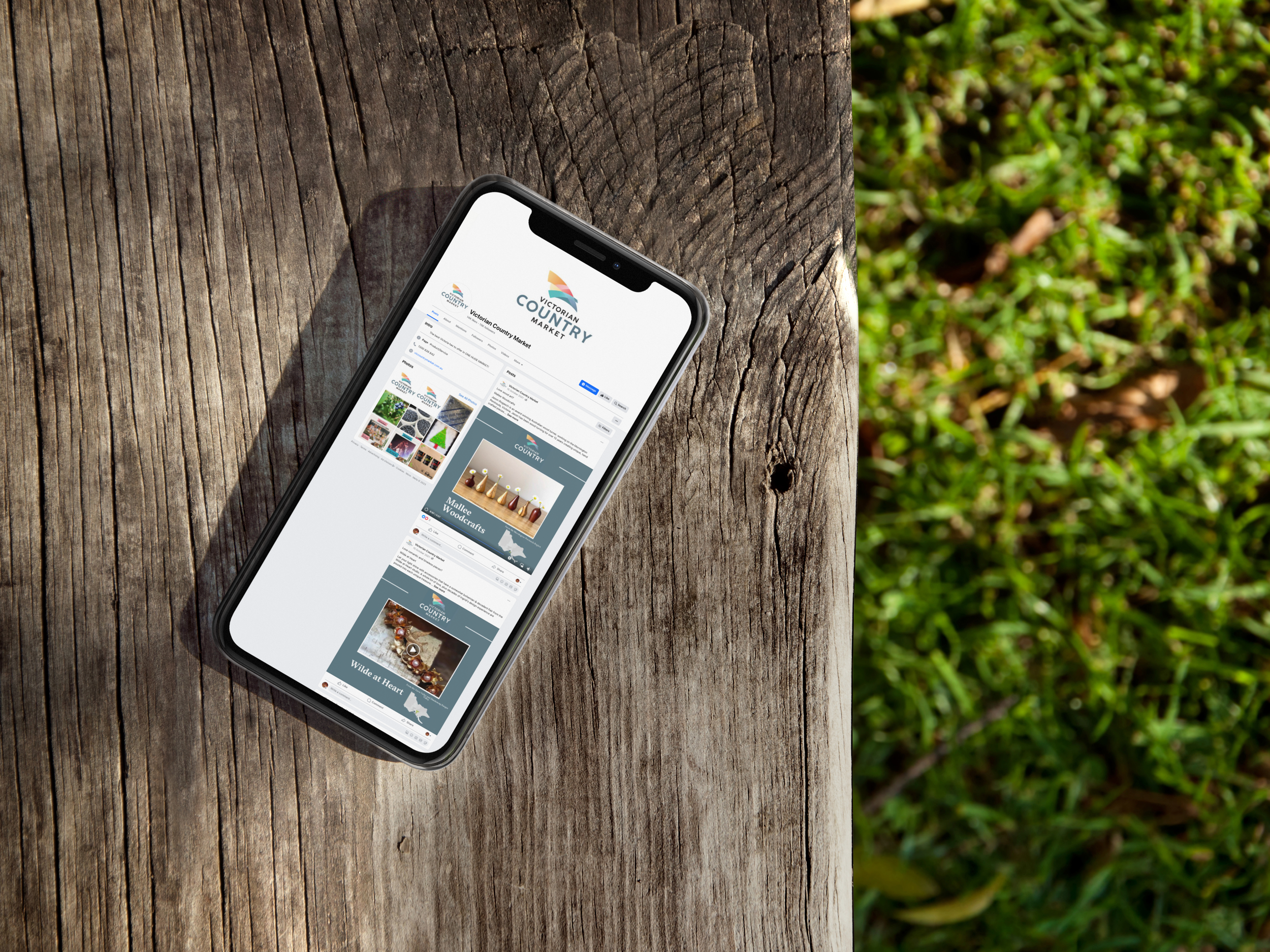 iphone-x-mockup-lying-on-a-wooden-bench-outdoors-a17484.png