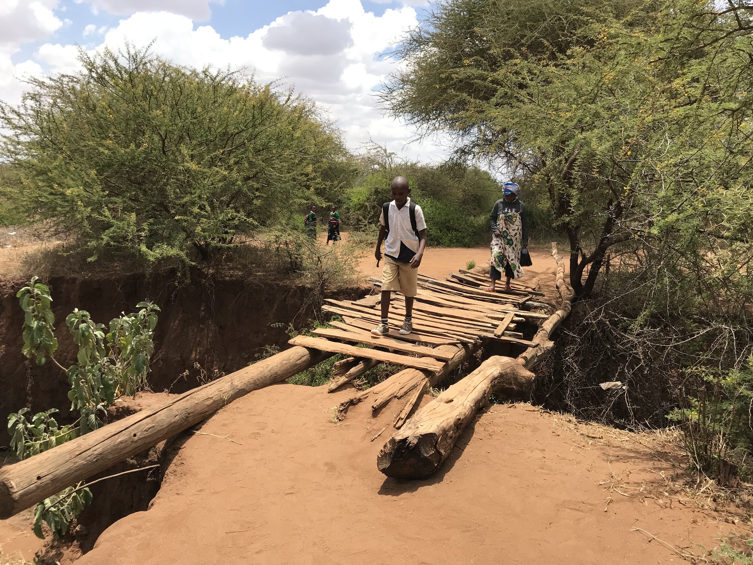 The original wood bridge used by the students and local community