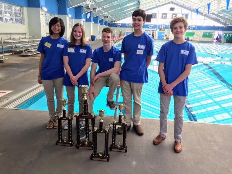Team Delta-V with their trophies