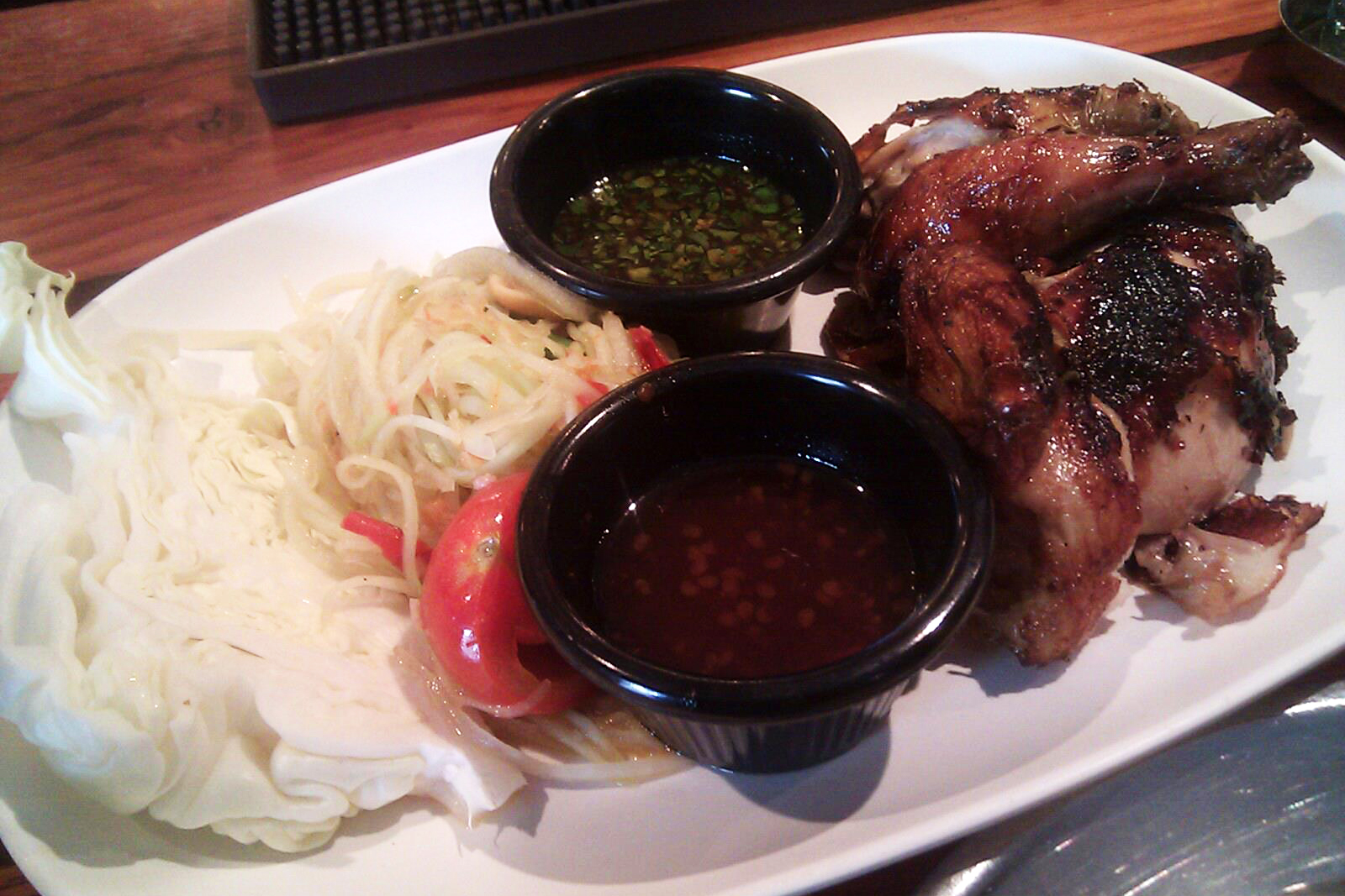 Grilled chicken and papaya salad from Pok Pok Portland. In a word: eh.