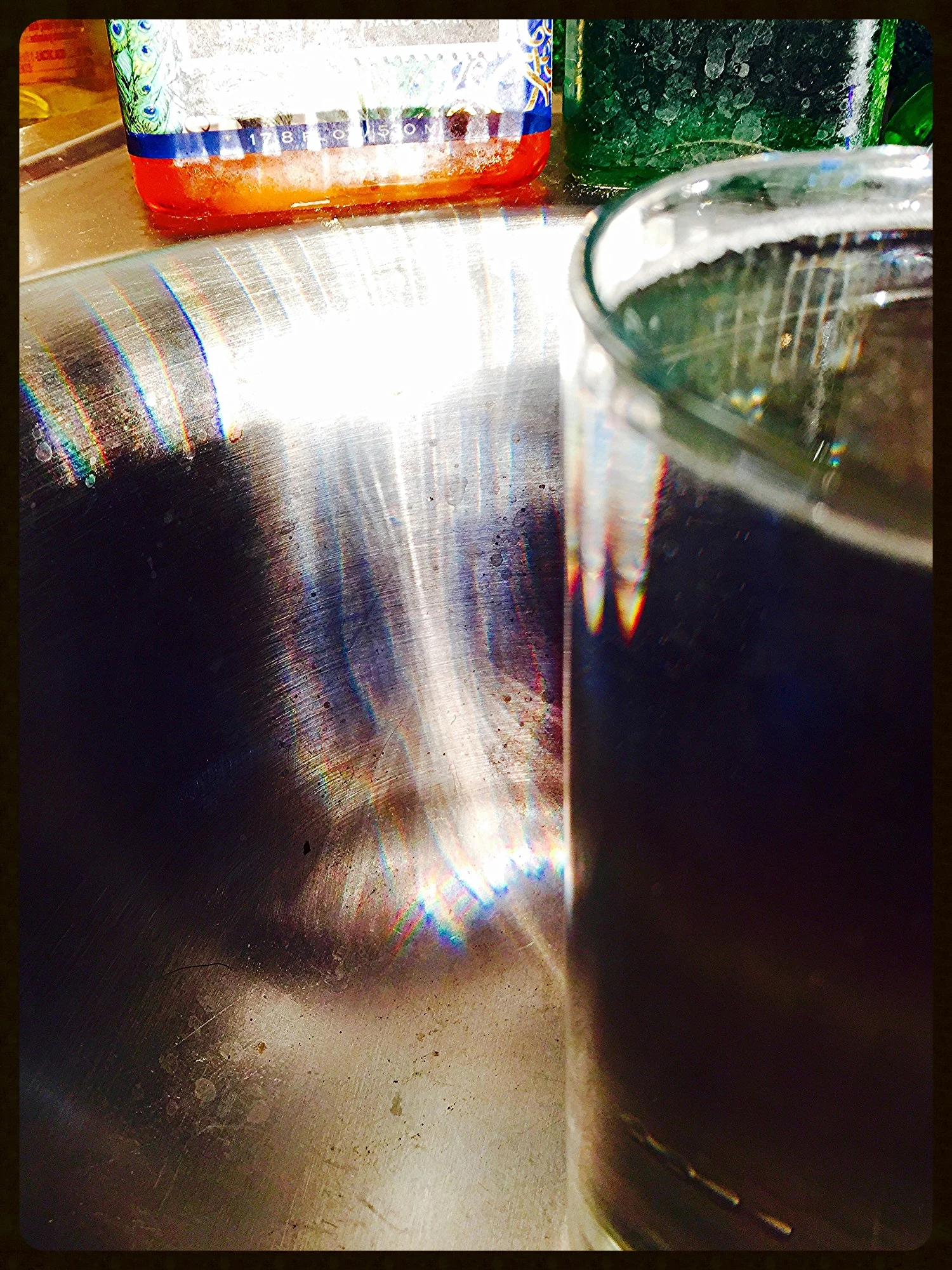 Tall Glass In A Sink