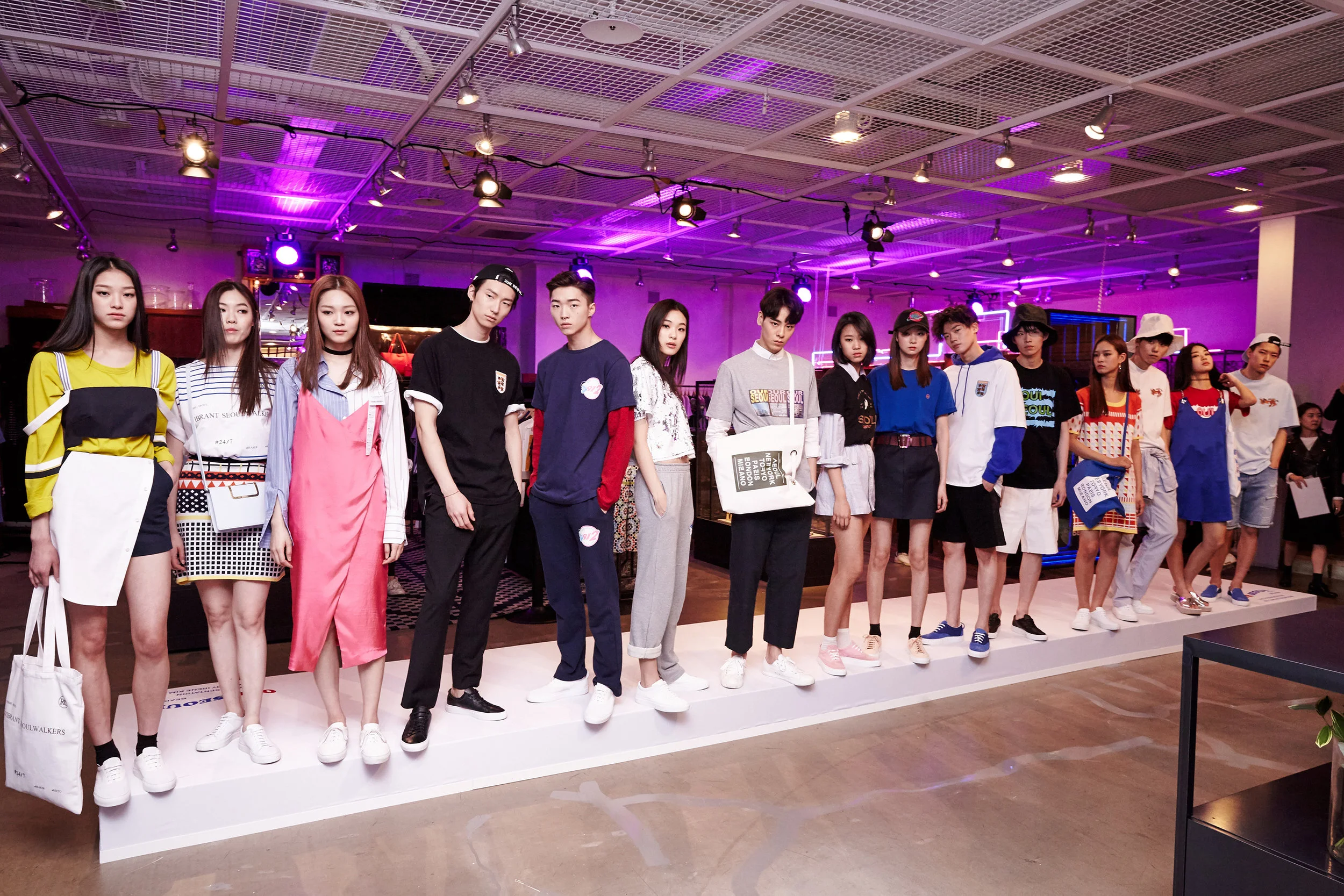 Mini catwalk with models styled by the Korean designers