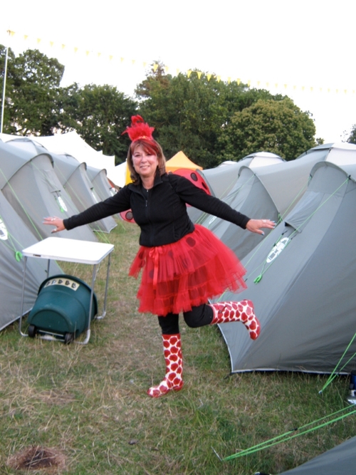 Dressed as a ladybug a few years ago at Latitude Festival. Note the black thermal leggings & top!