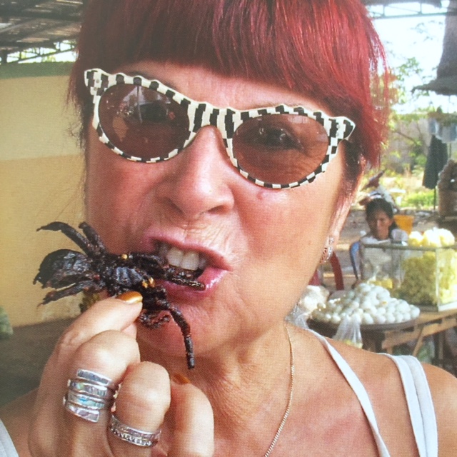 Trying fried tarantula in Cambodia! 